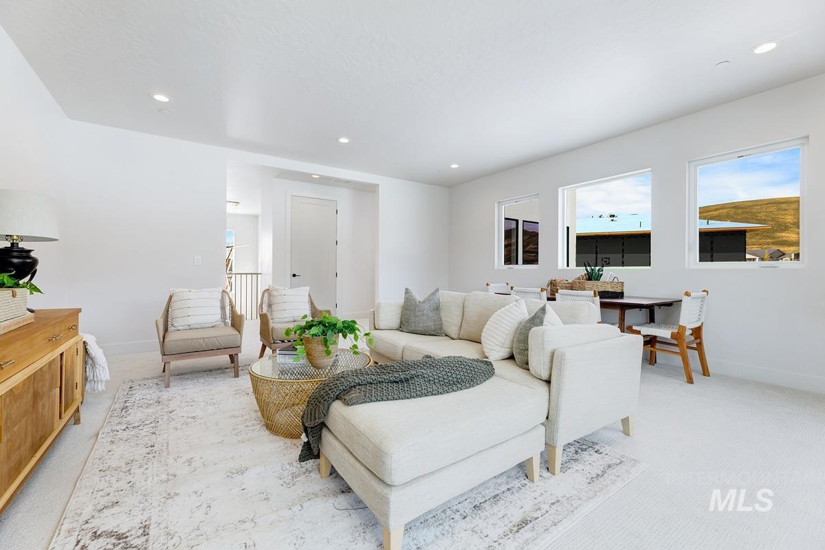 Living room with carpet and recessed lighting