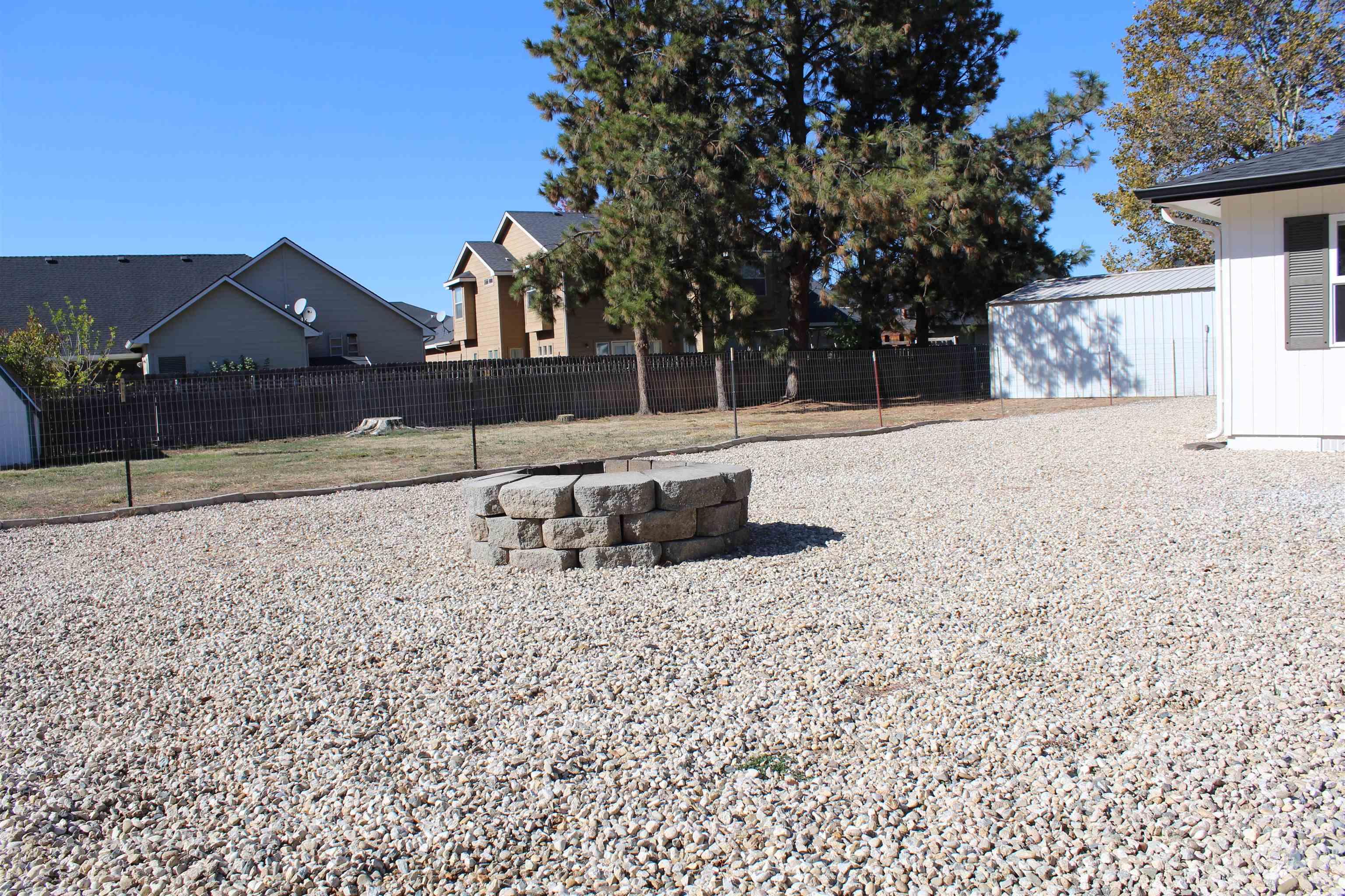 View of yard with a fire pit