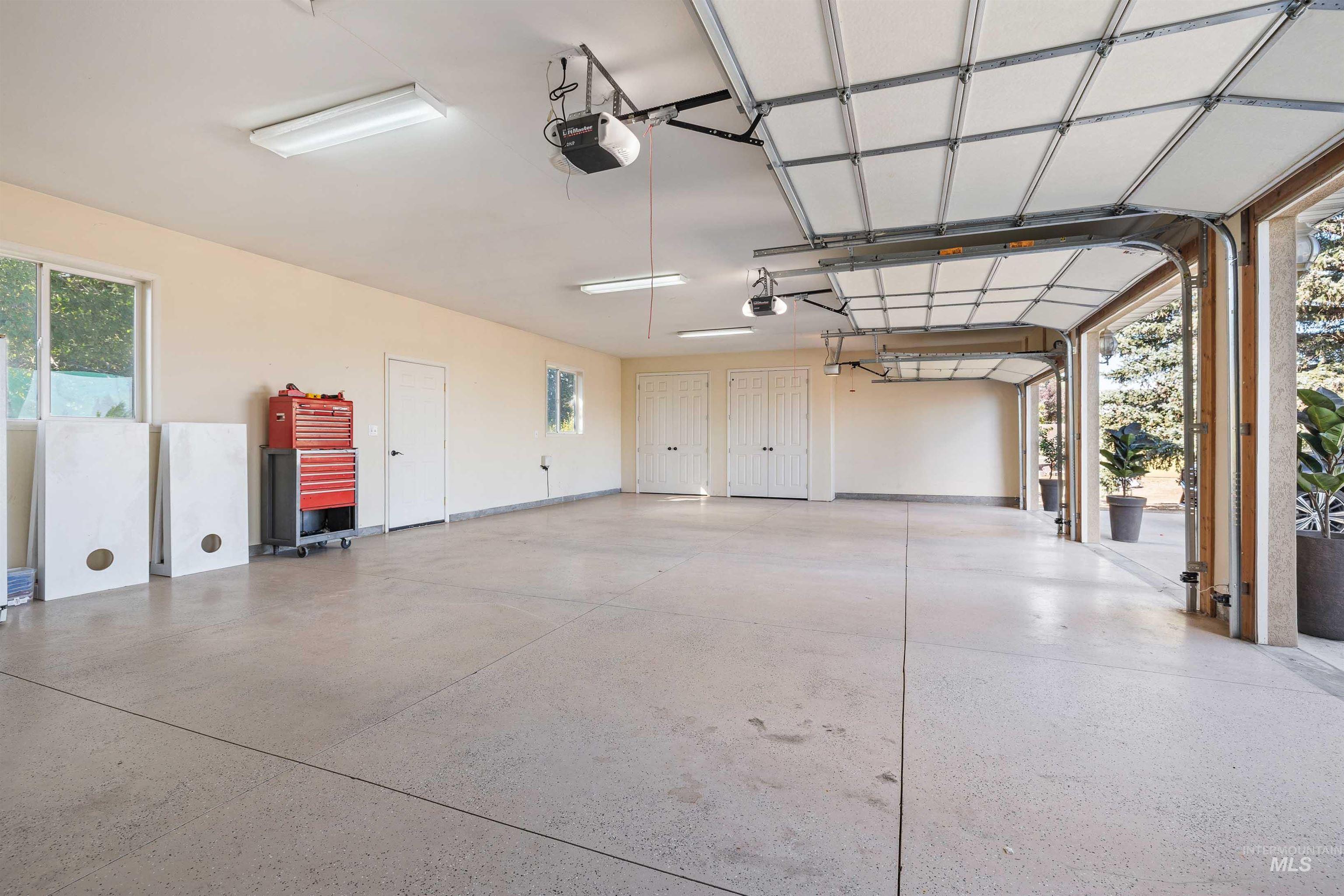 Garage featuring a garage door opener