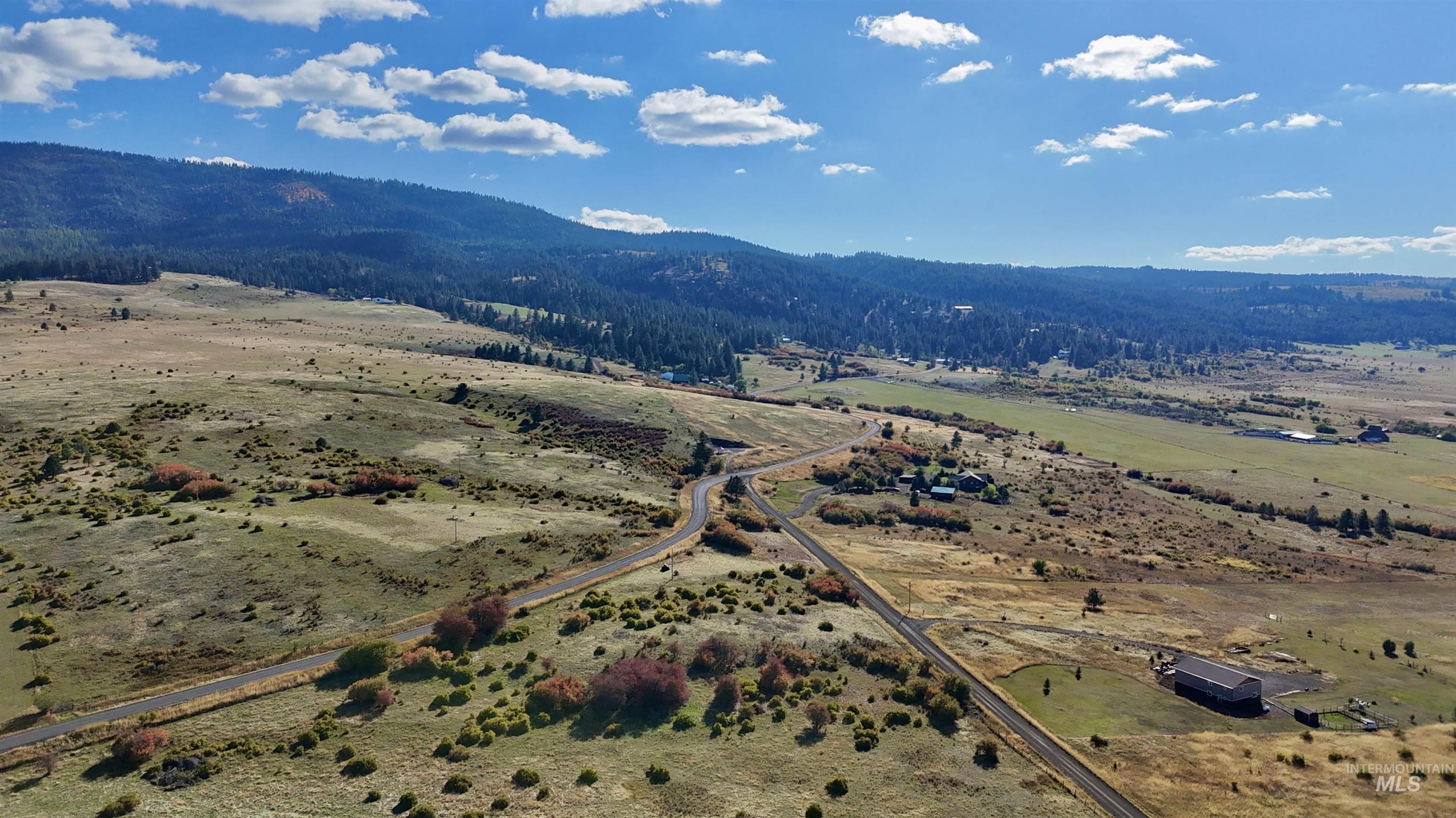 View of rural area with a mountain backdrop