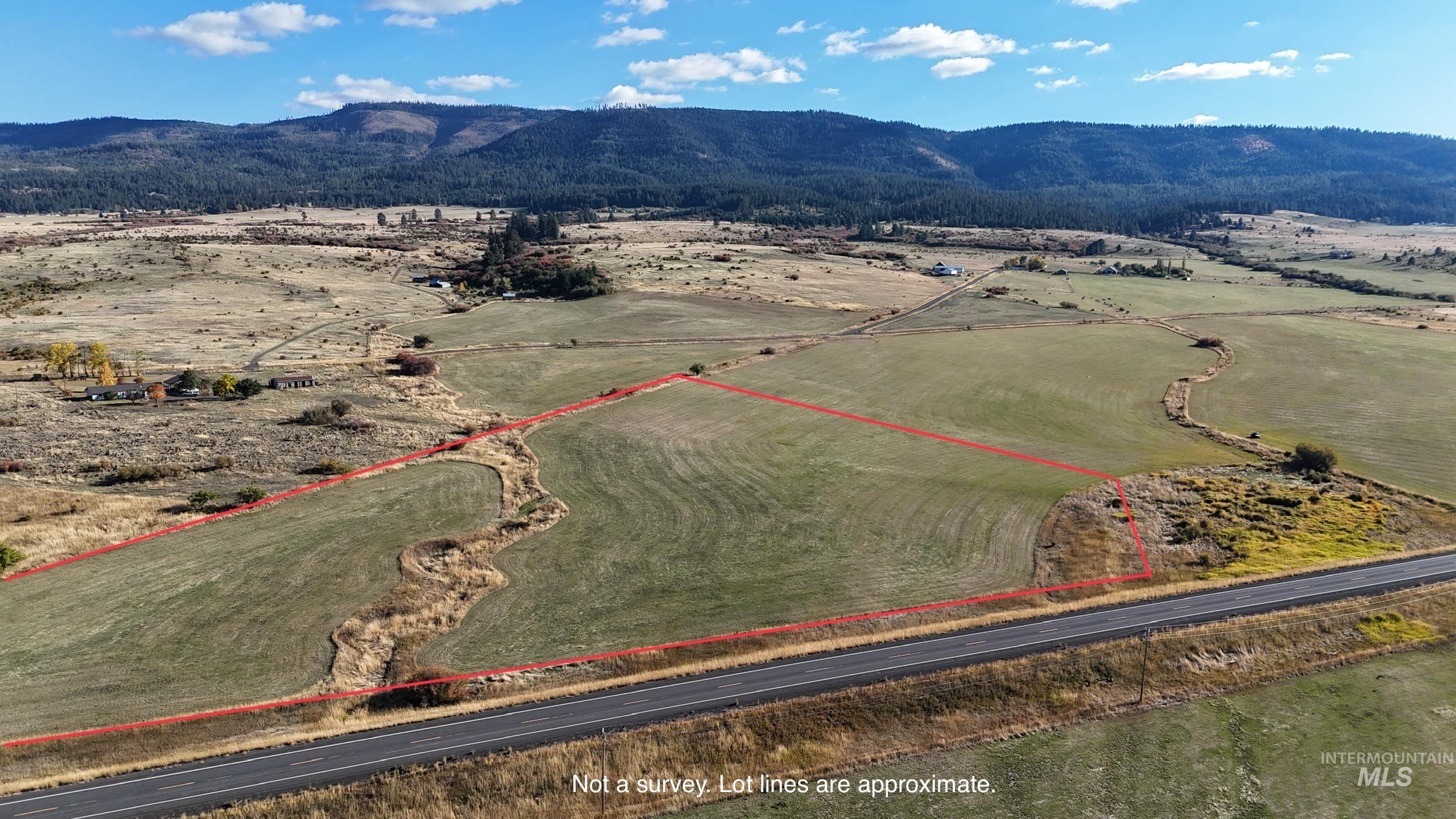 View of rural area featuring property boundaries highlighted and mountains