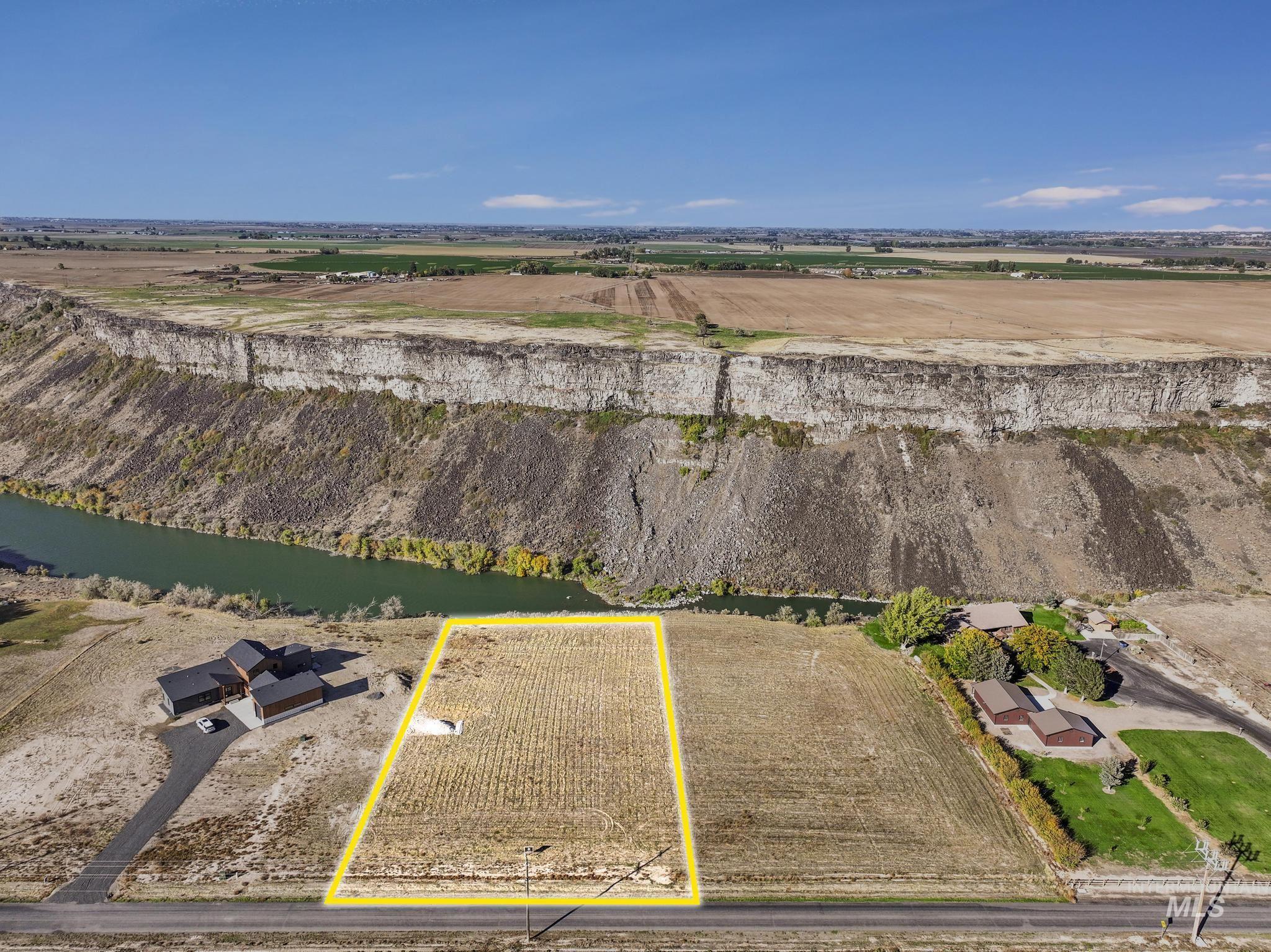 View of rural area featuring extensive farmland and property parcel outlined