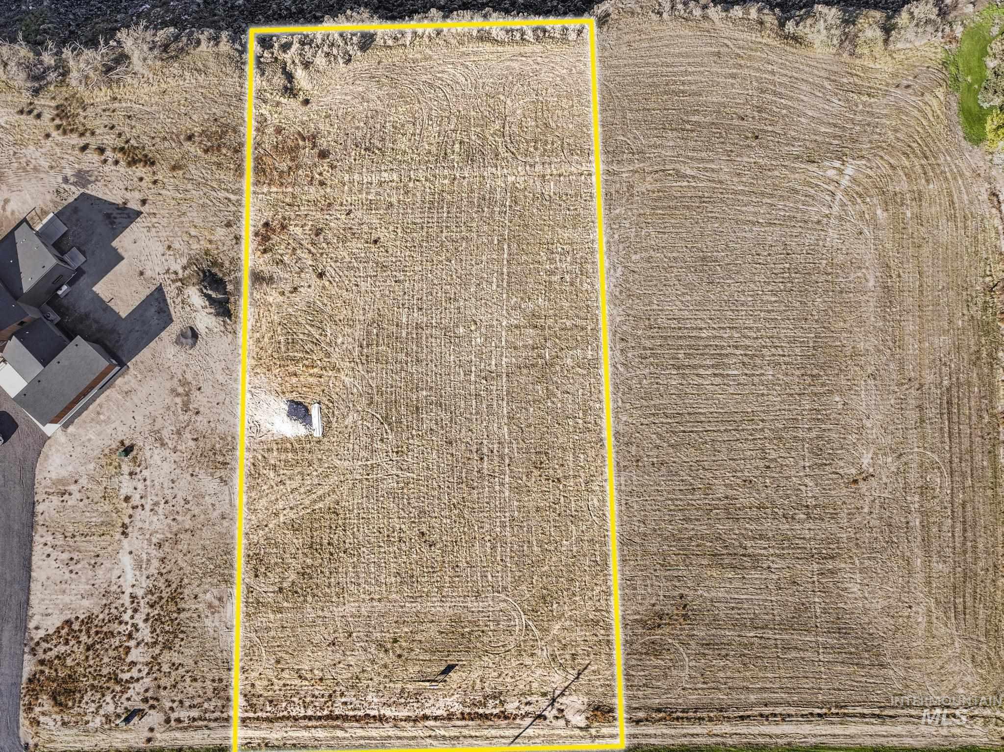 Aerial view of property's location featuring property parcel outlined