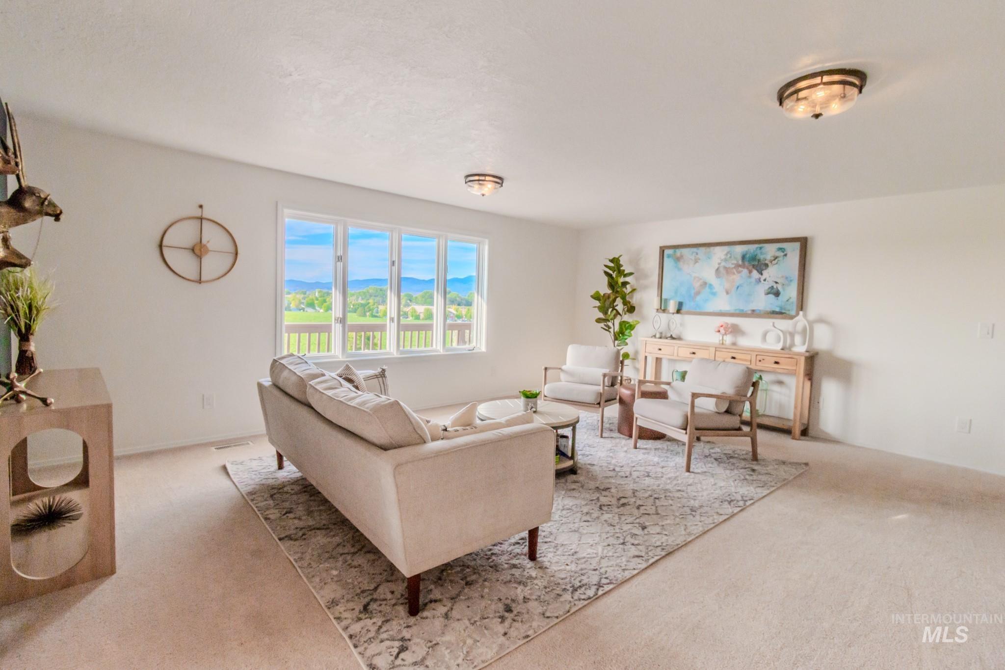 Living room featuring carpet floors