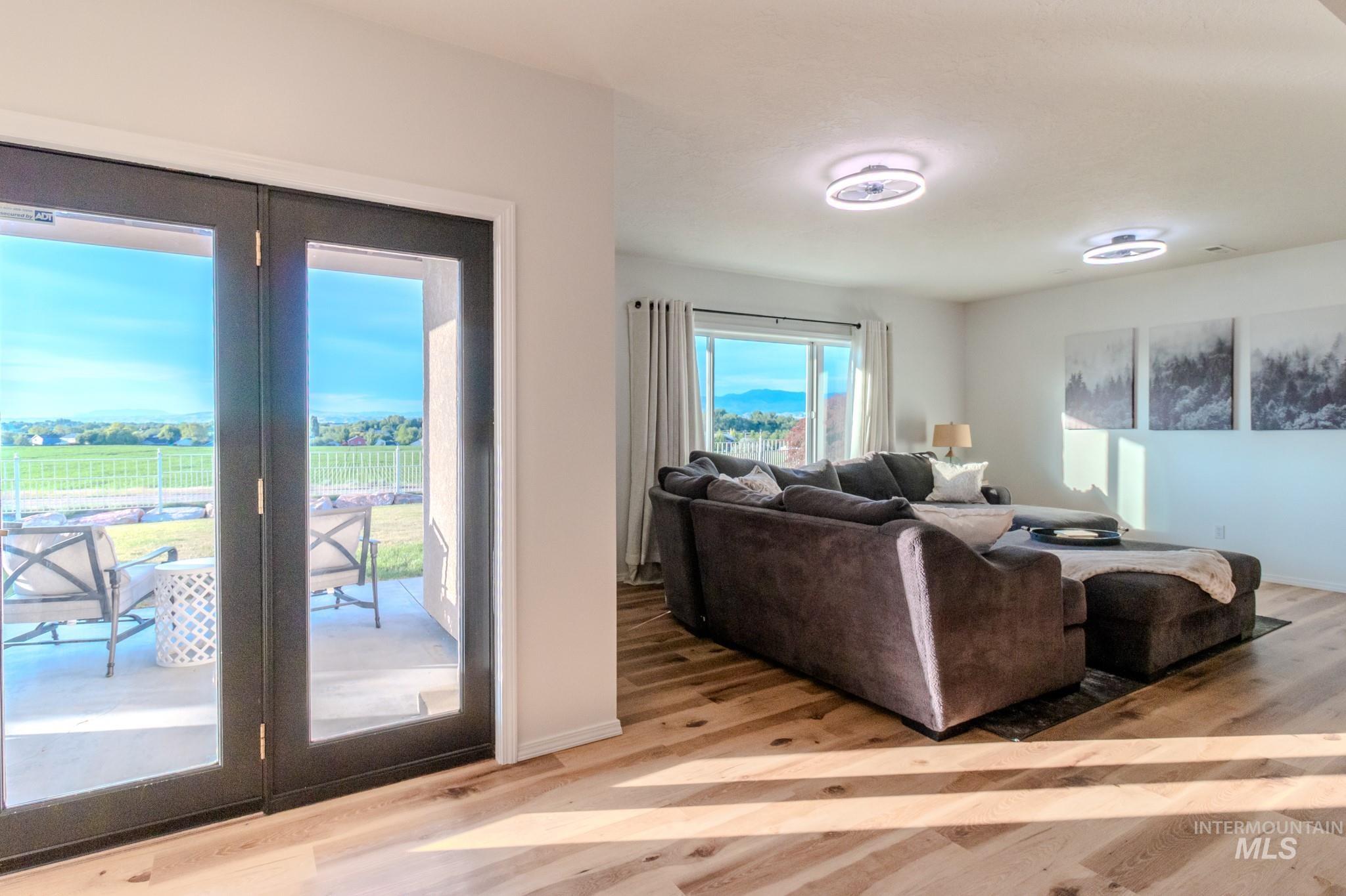 Living area with light wood-style flooring