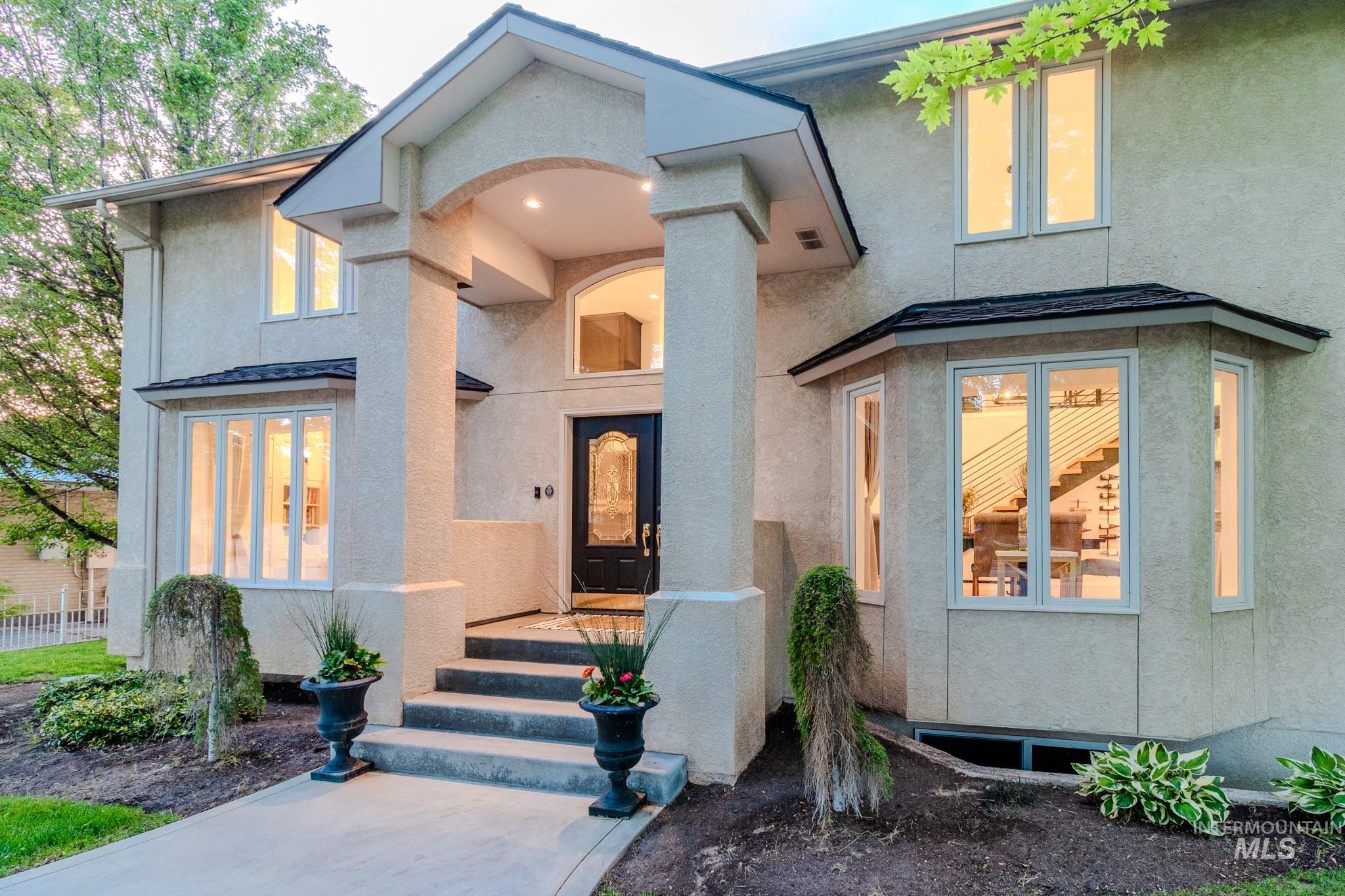 View of front of house with stucco siding