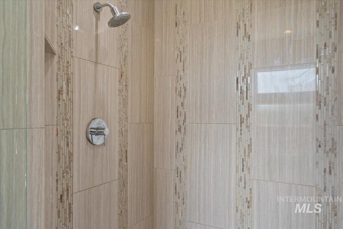 Bathroom view of tiled shower