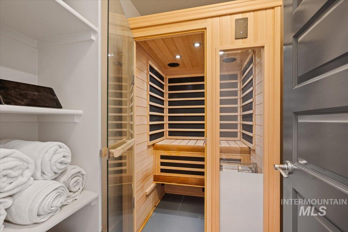 Sauna / steam room with recessed lighting