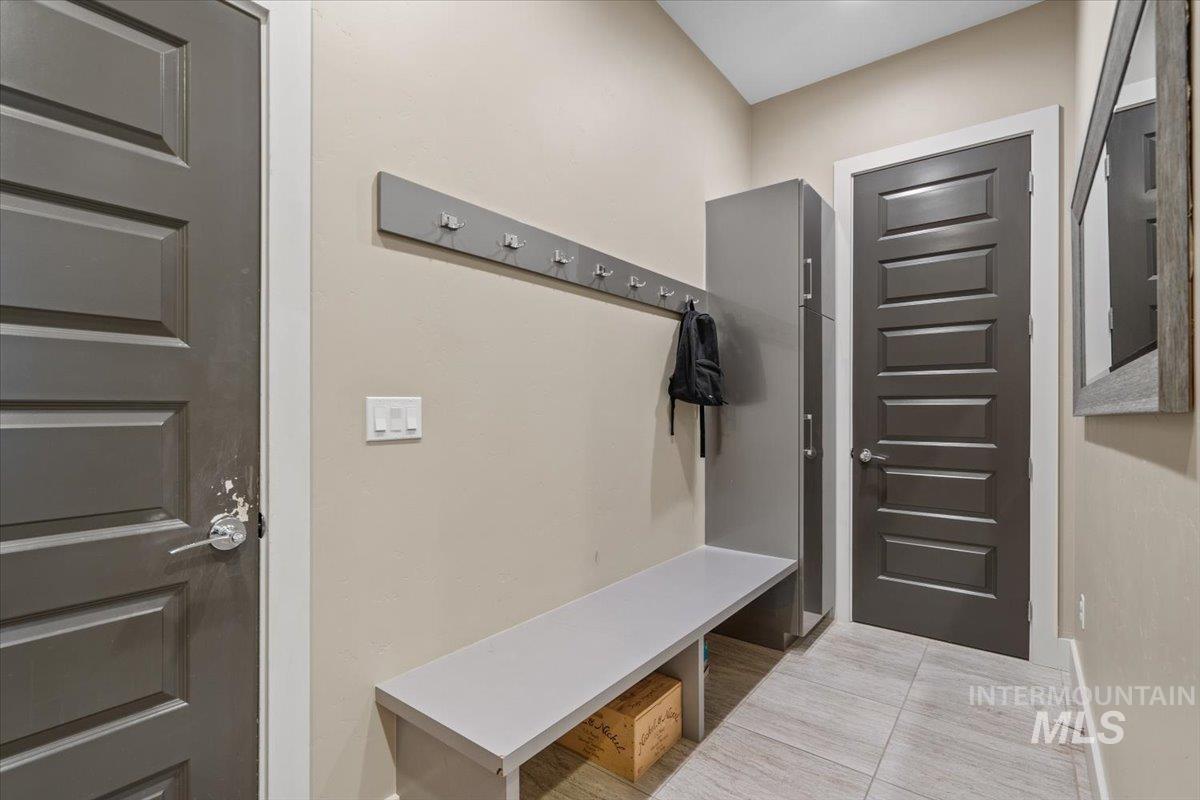 Mudroom featuring tile patterned flooring