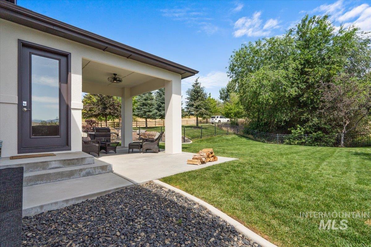 View of yard with a patio