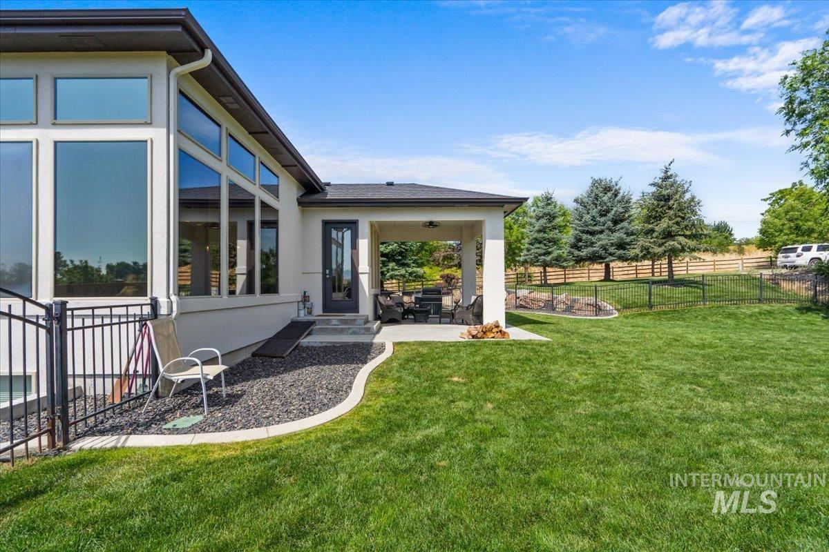 View of yard with a patio area