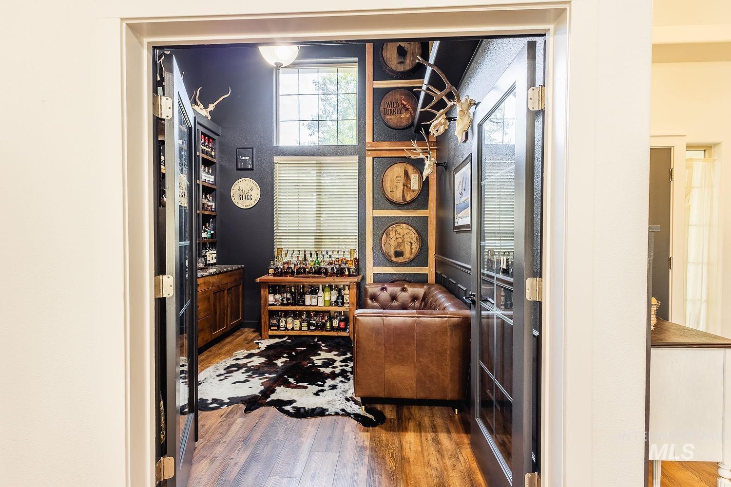 Wine room with wood finished floors