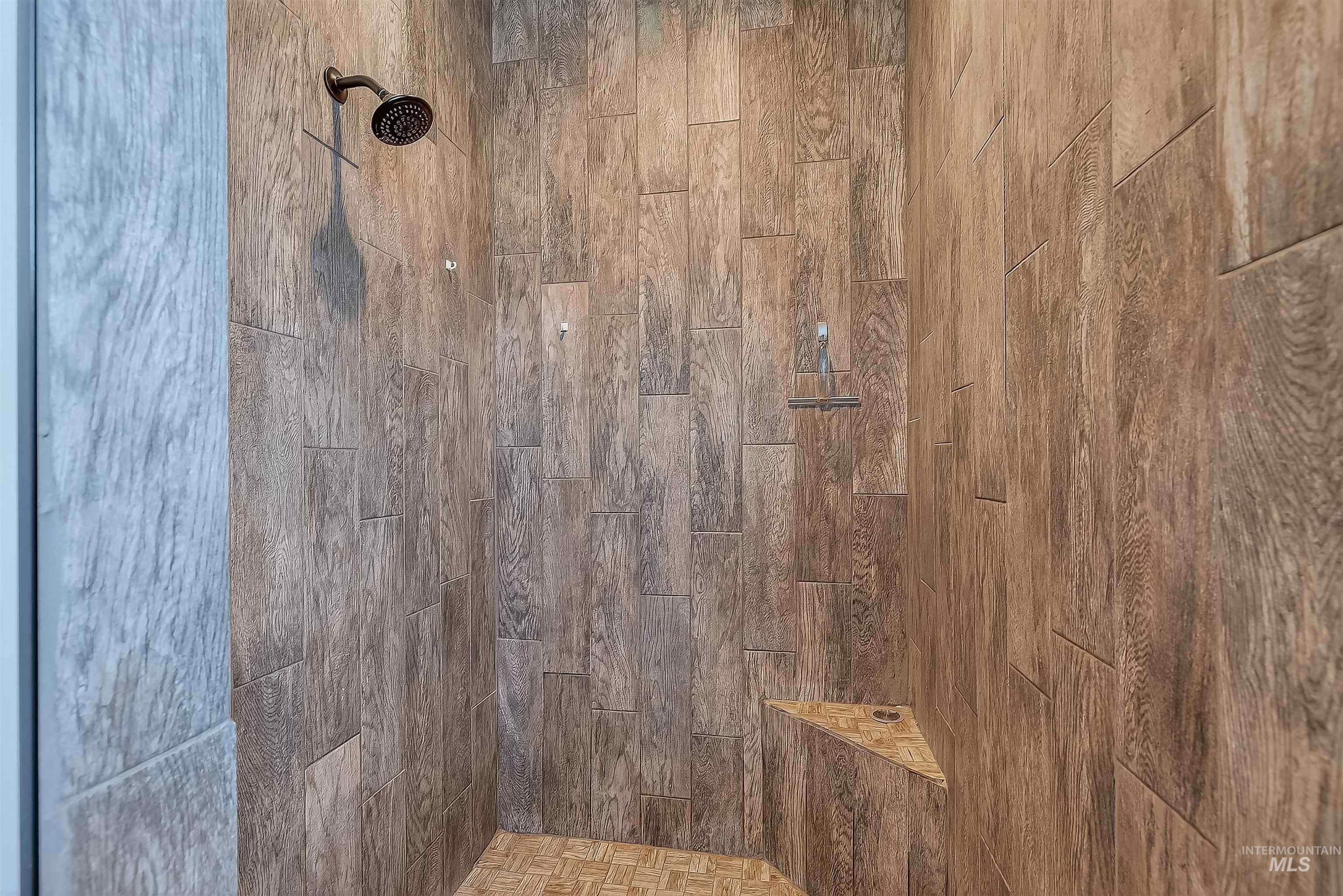 Bathroom view of tiled shower