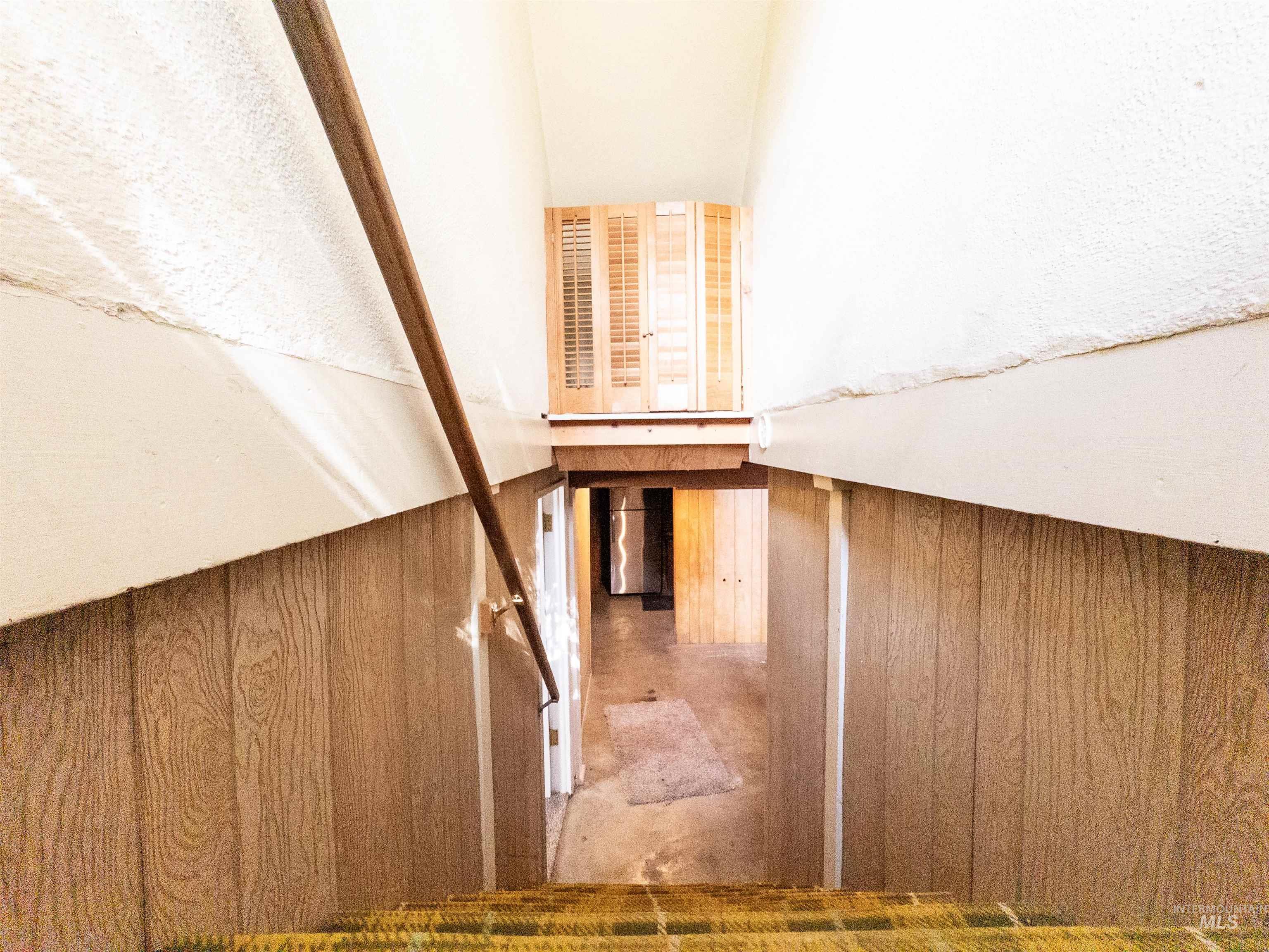 Staircase with wooden walls
