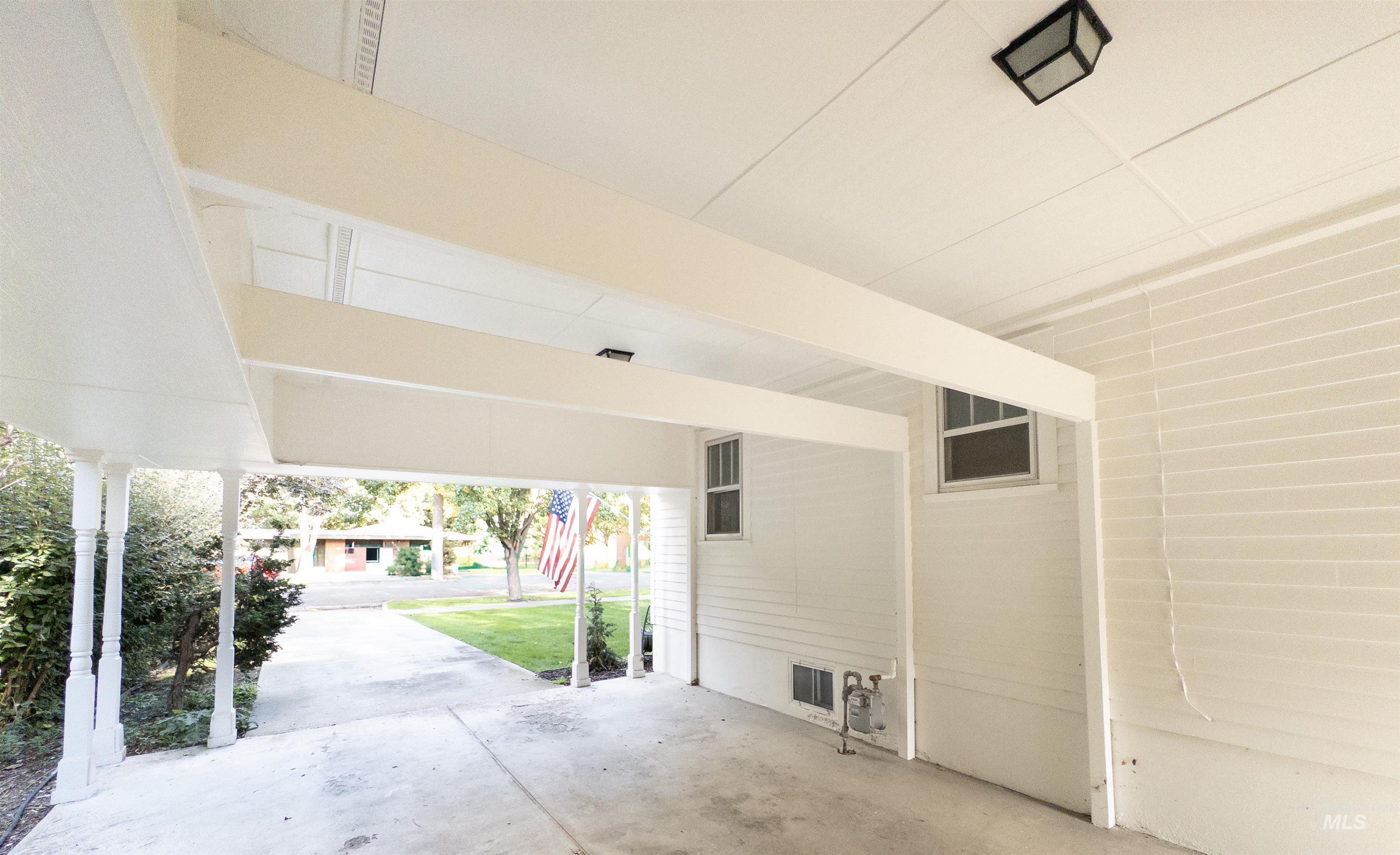 View of patio with an attached carport