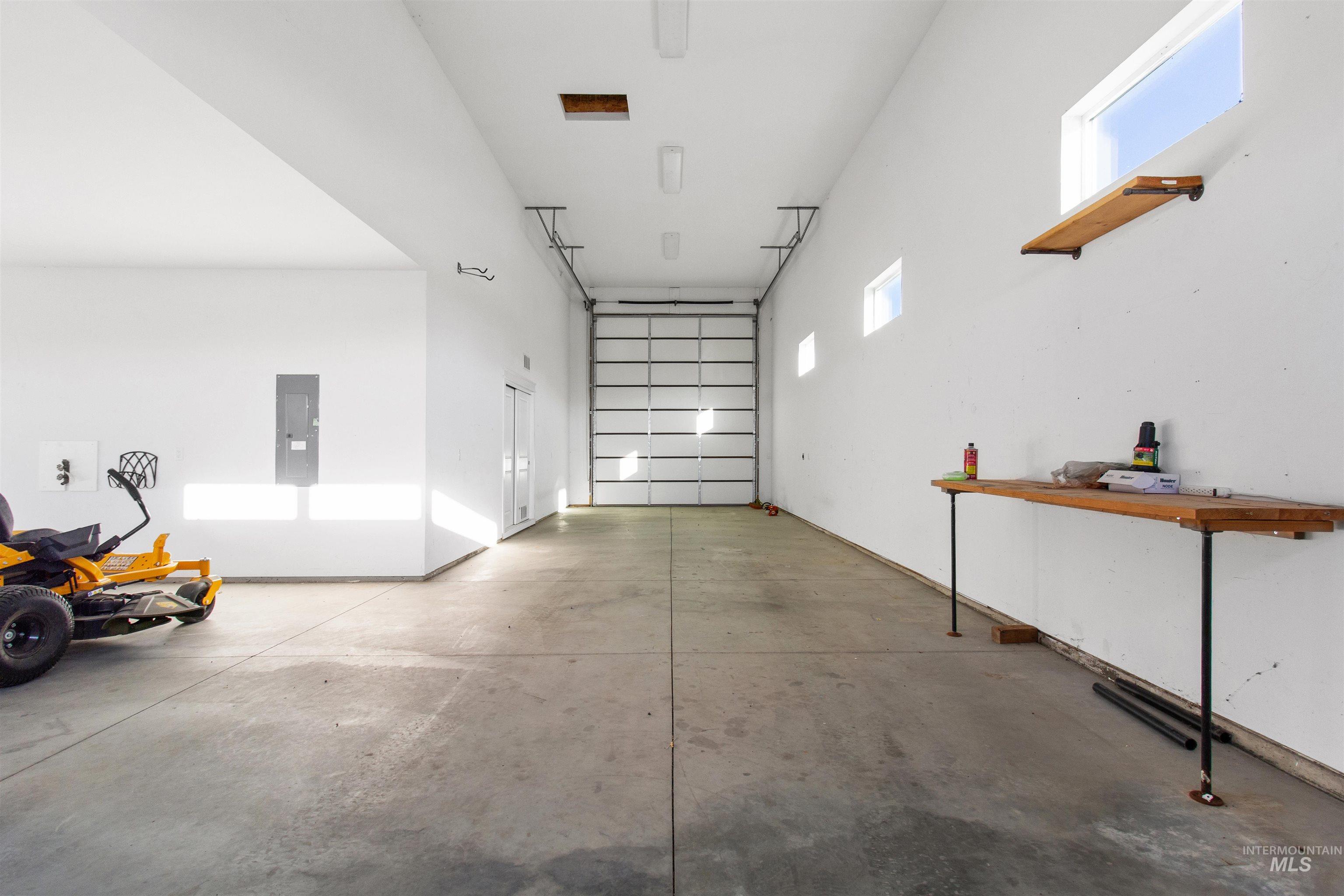 Garage featuring electric panel