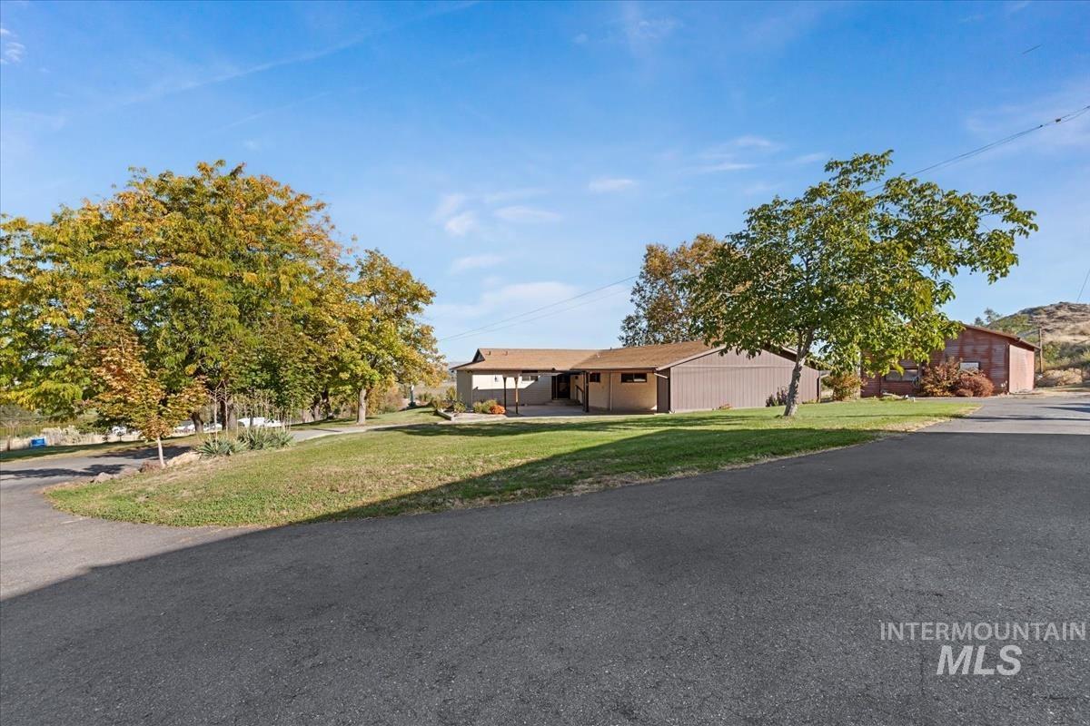 View of front of home featuring a front yard