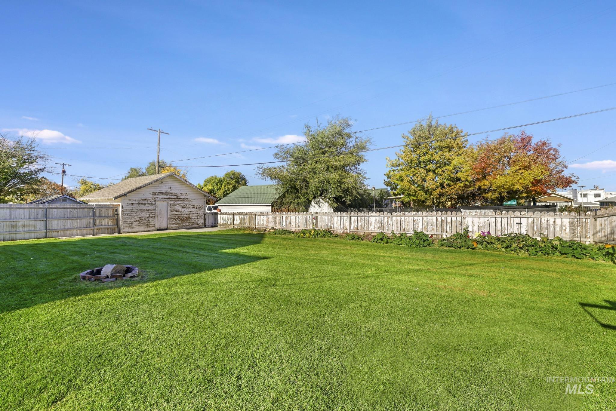 View of fenced backyard