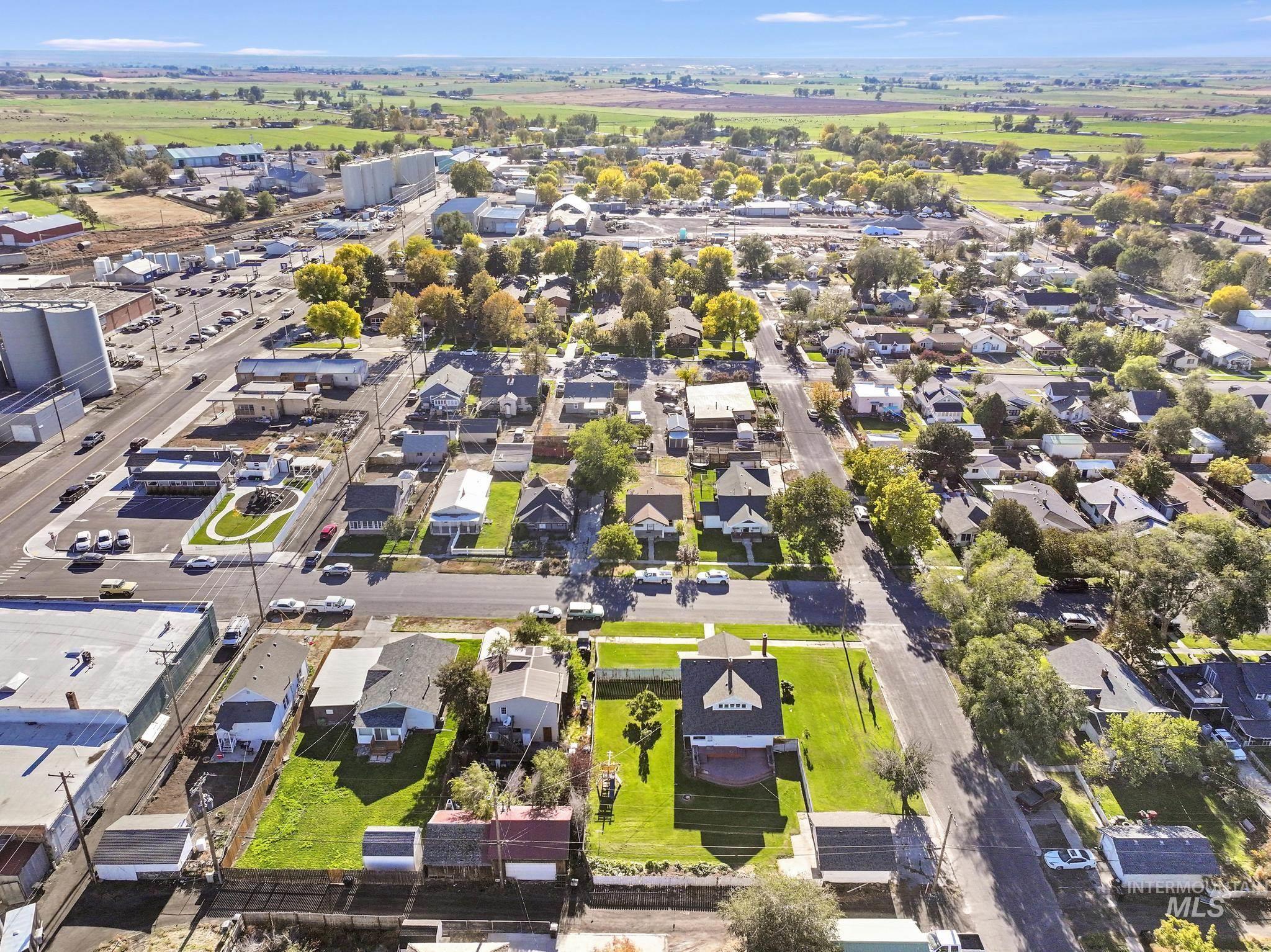 Aerial overview of property's location with nearby suburban area