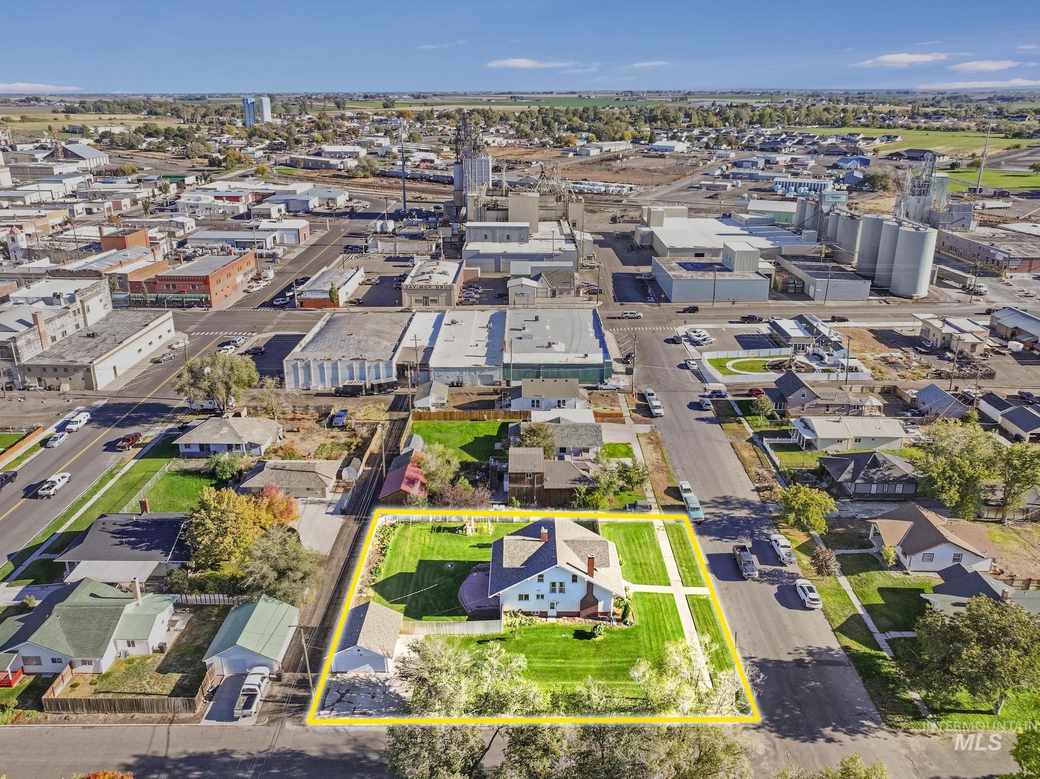 View of property location with property parcel outlined and an industrial area