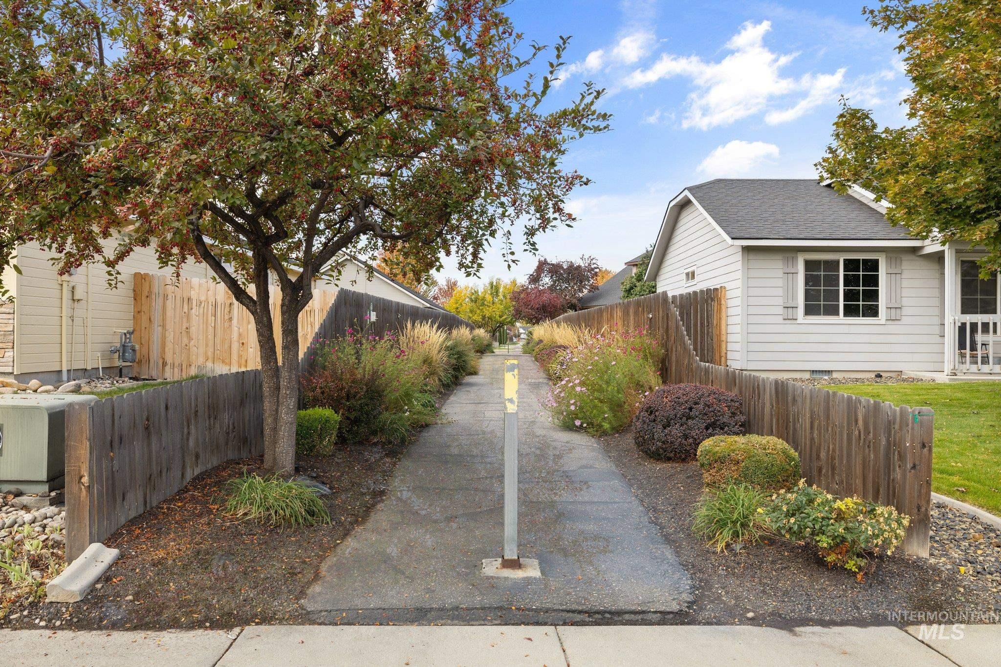View of property exterior featuring a shingled roof and crawl space