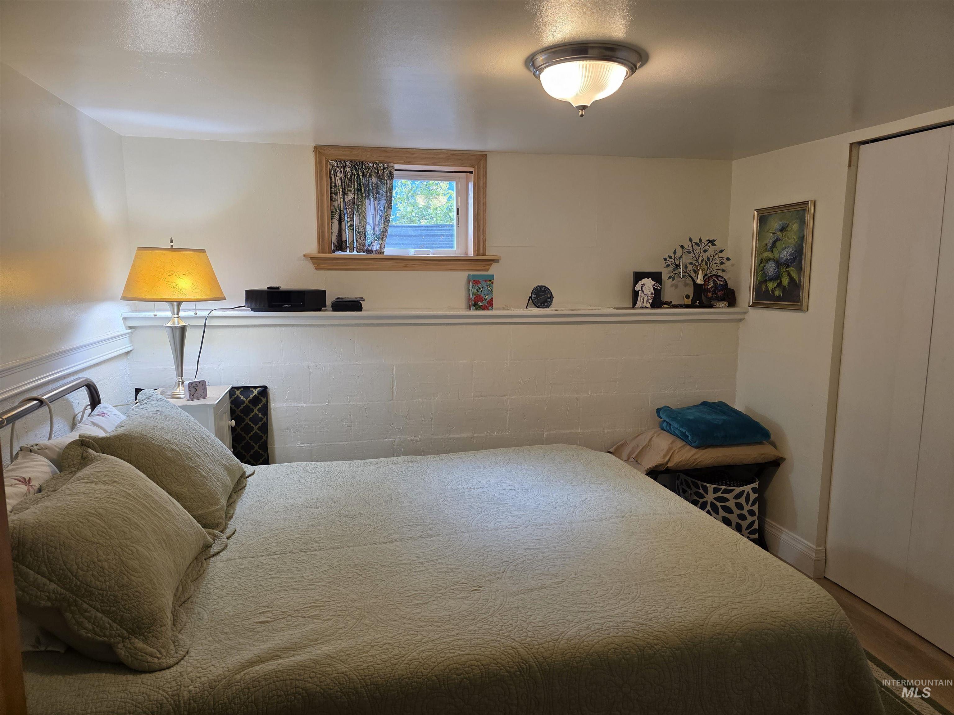 Bedroom featuring baseboards