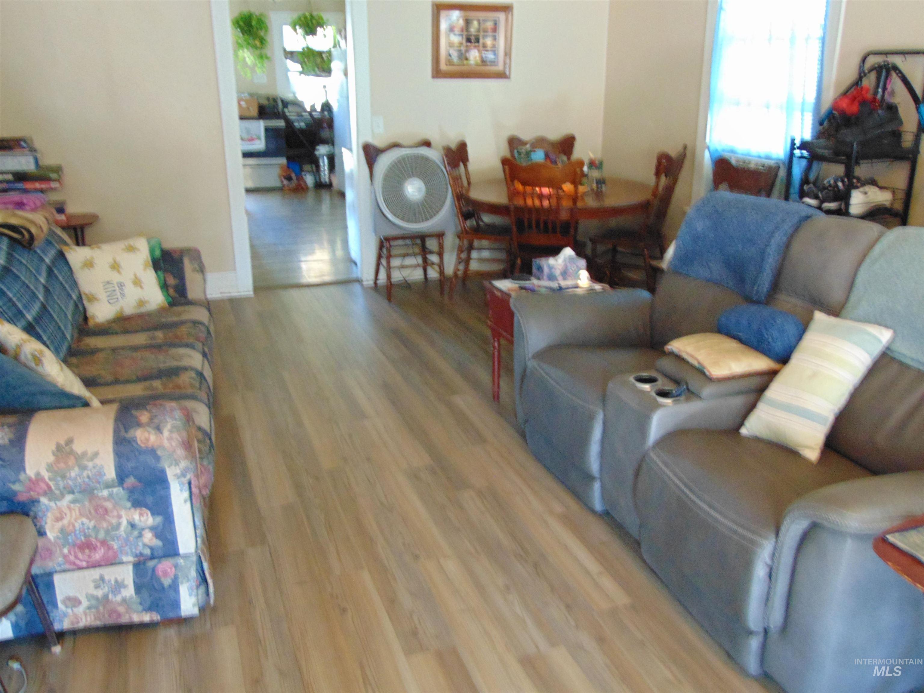 Living room featuring wood finished floors