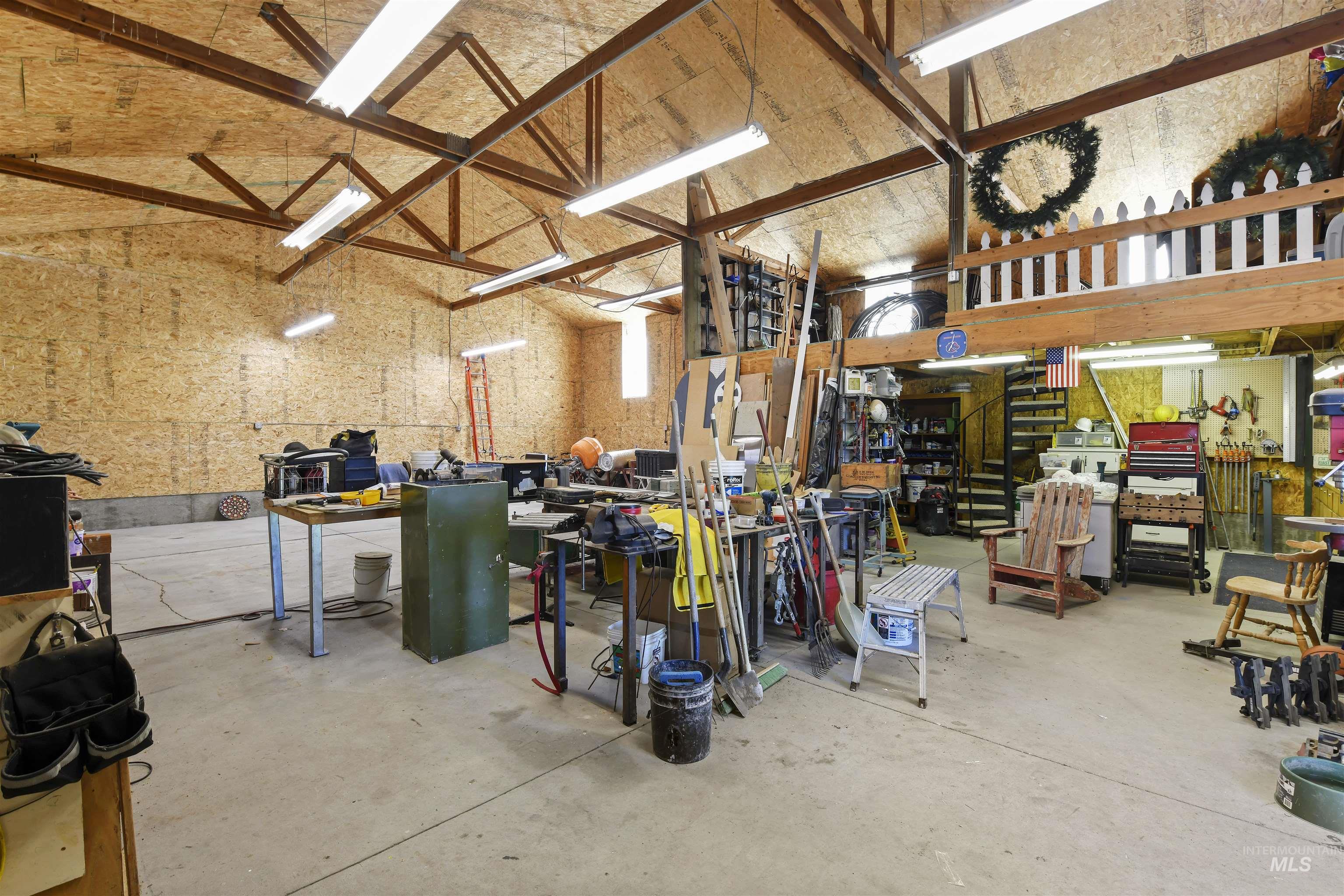 Garage featuring a workshop area