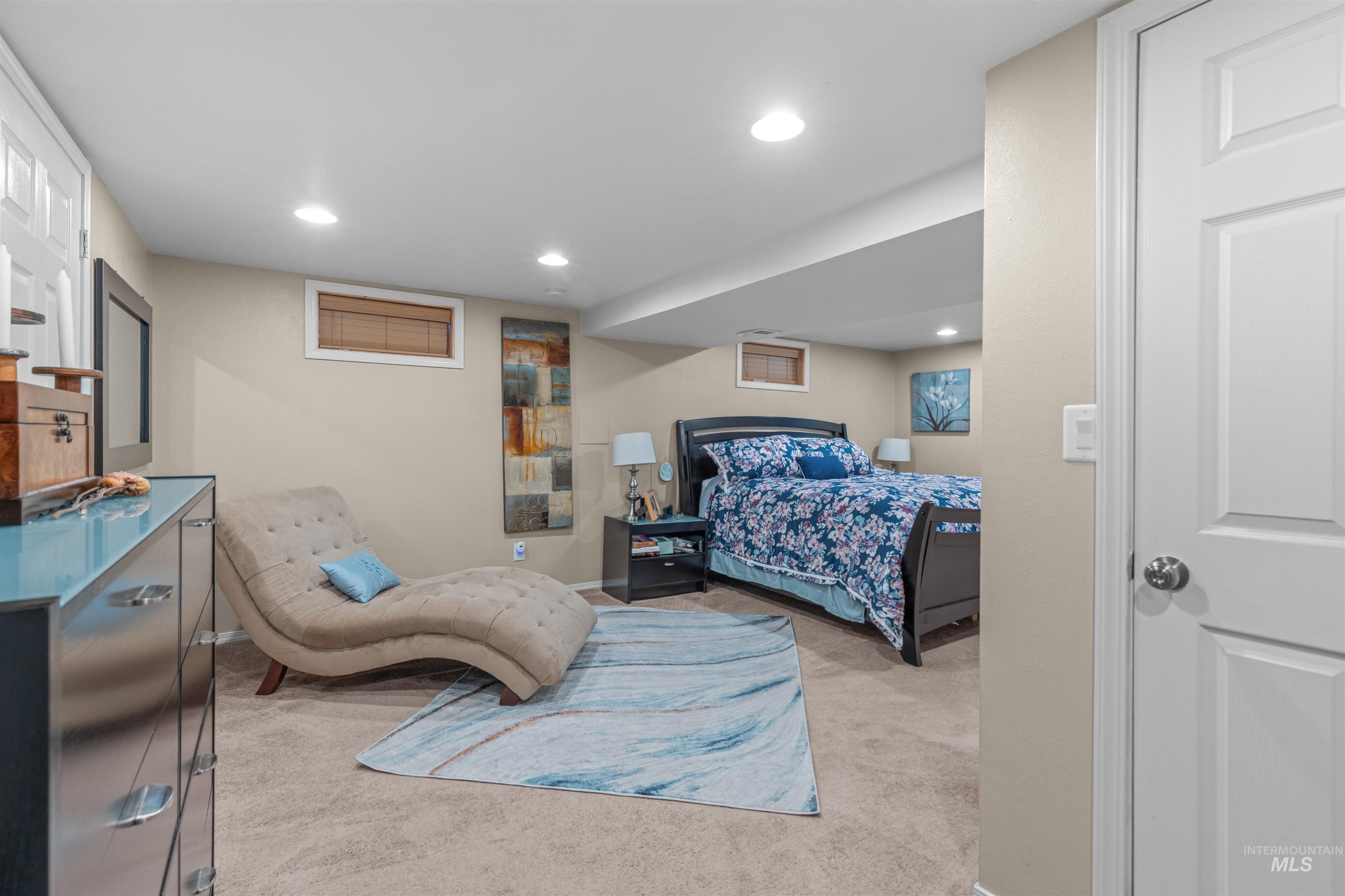 Bedroom featuring recessed lighting and light colored carpet