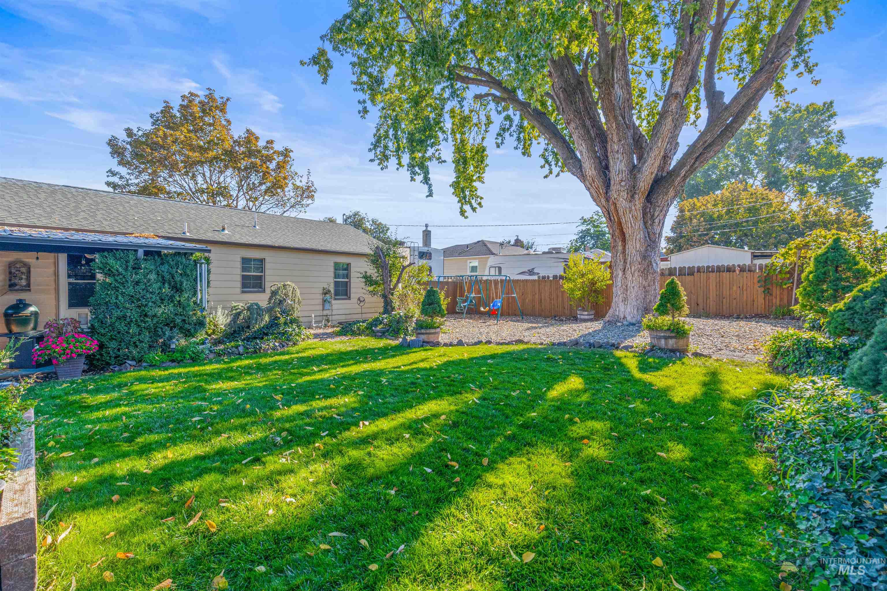 View of fenced backyard