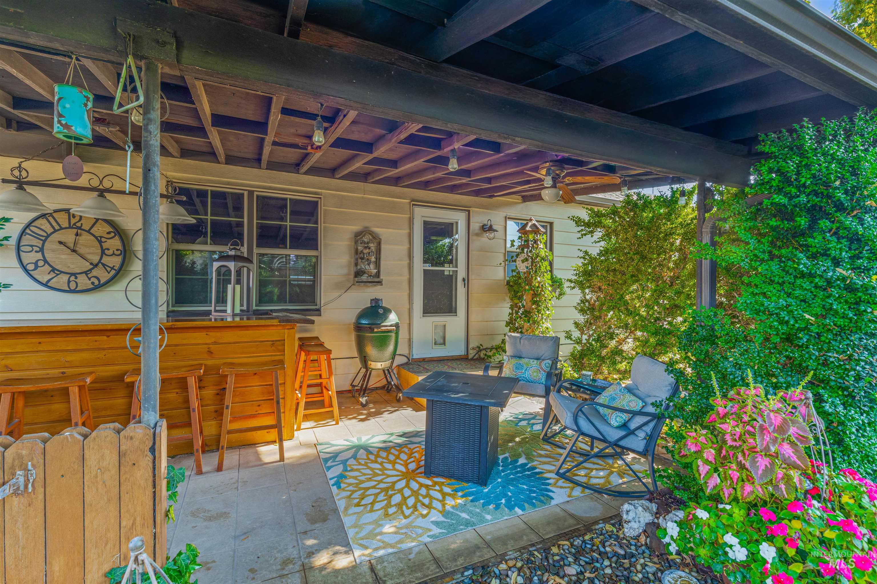 View of patio featuring a Bar, ceiling fan and area for grilling