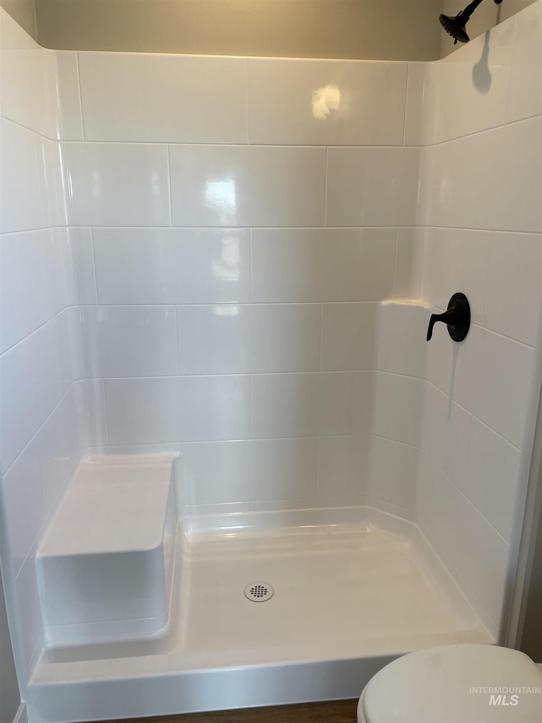 Bathroom featuring a stall shower