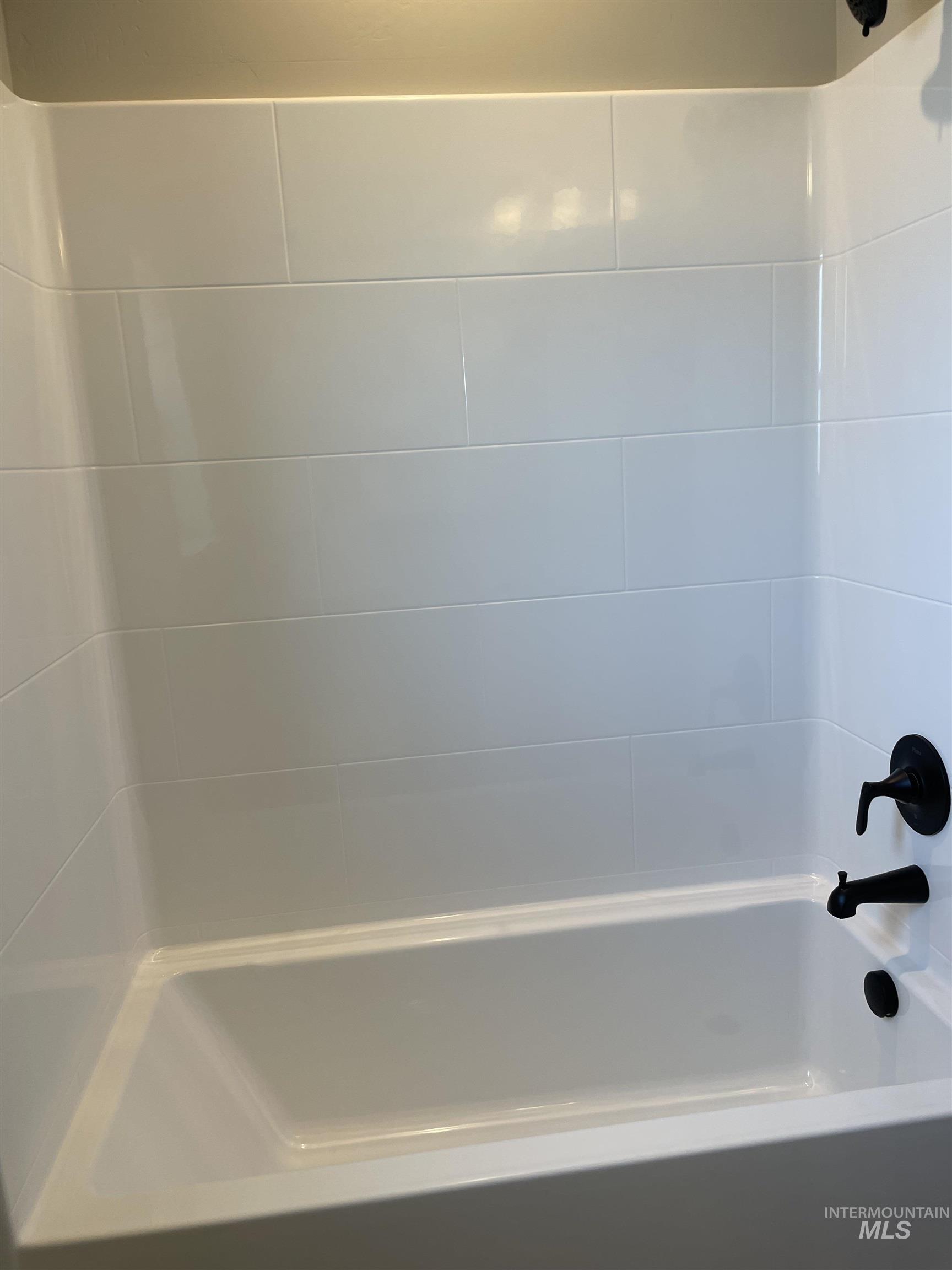 Bathroom featuring  shower combination