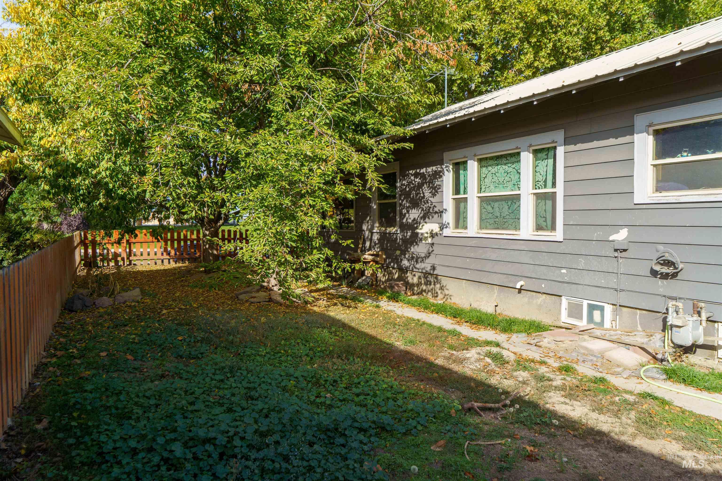 View of fenced backyard