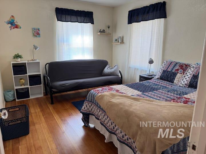Bedroom featuring wood finished floors
