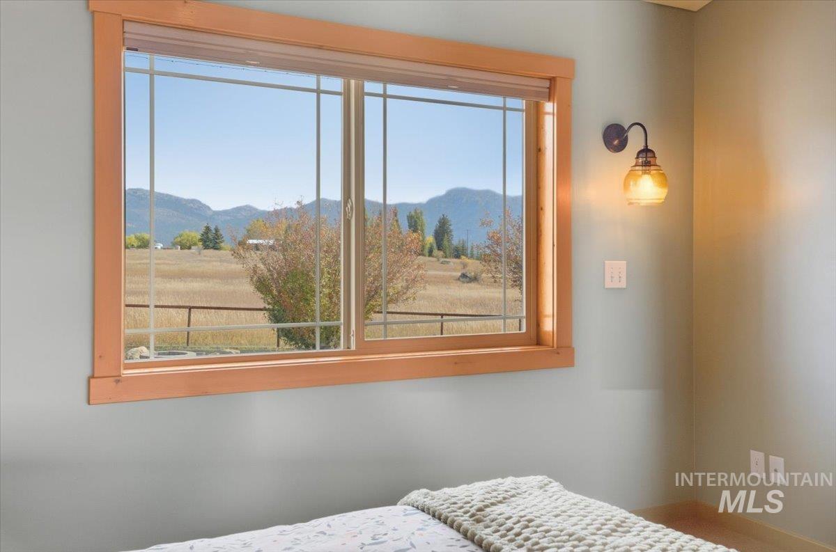 Bedroom with a mountain view
