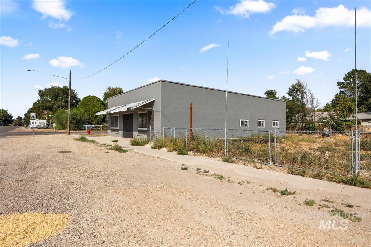 View of side of property featuring stucco siding