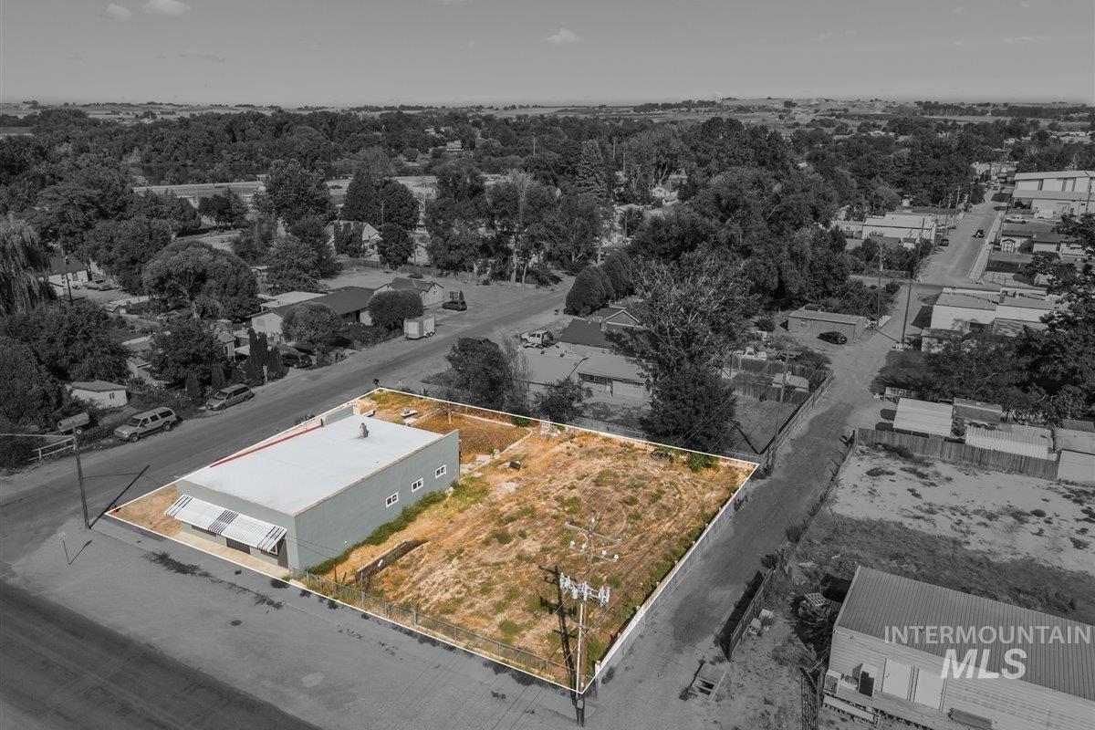 Aerial overview of property's location featuring property boundaries highlighted