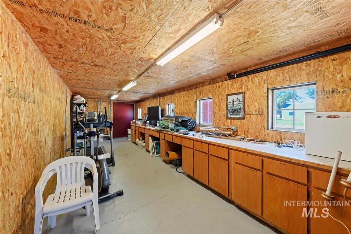 Misc room with concrete floors and plenty of natural light