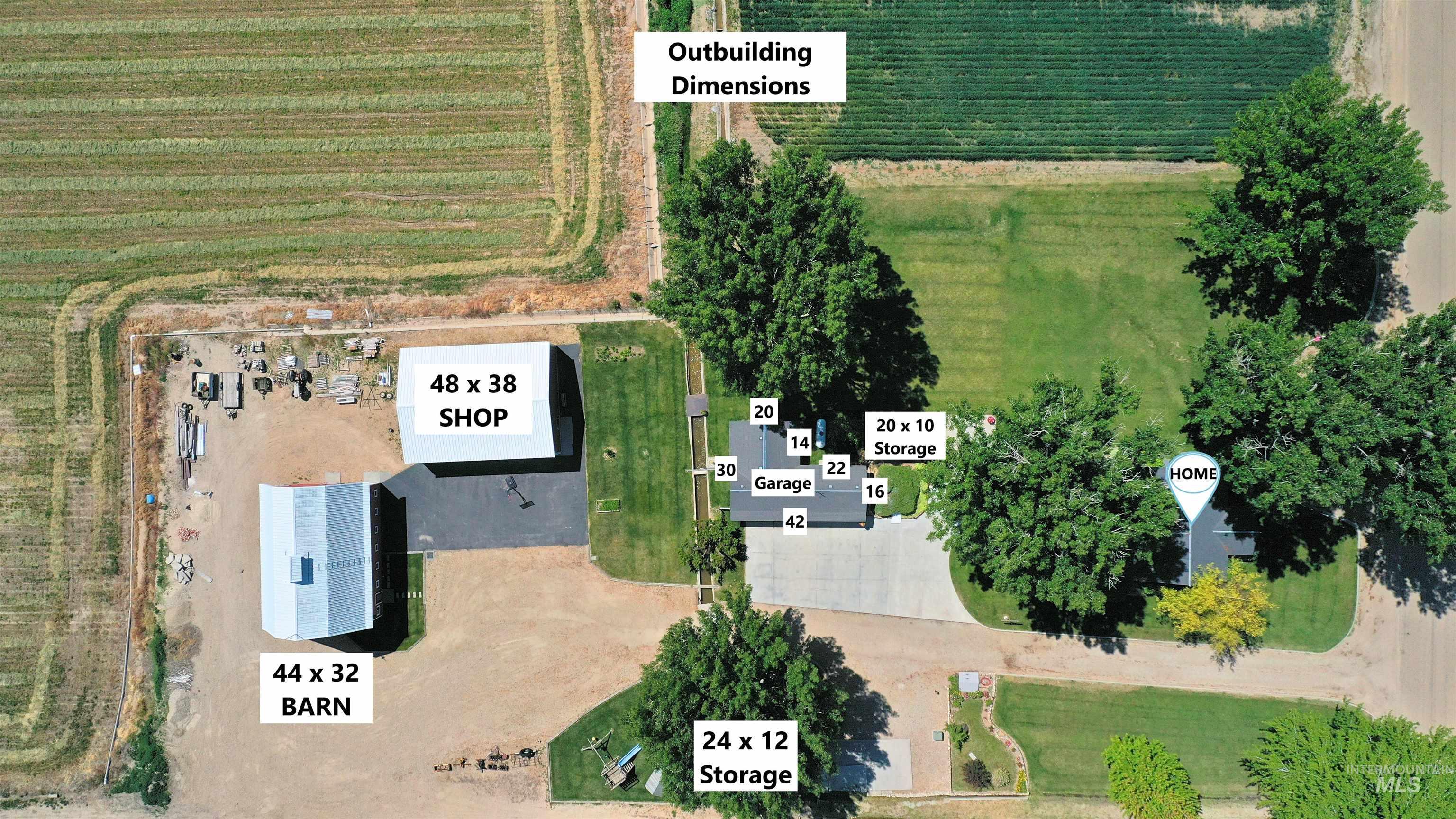 Aerial view of sparsely populated area featuring large plots for crops