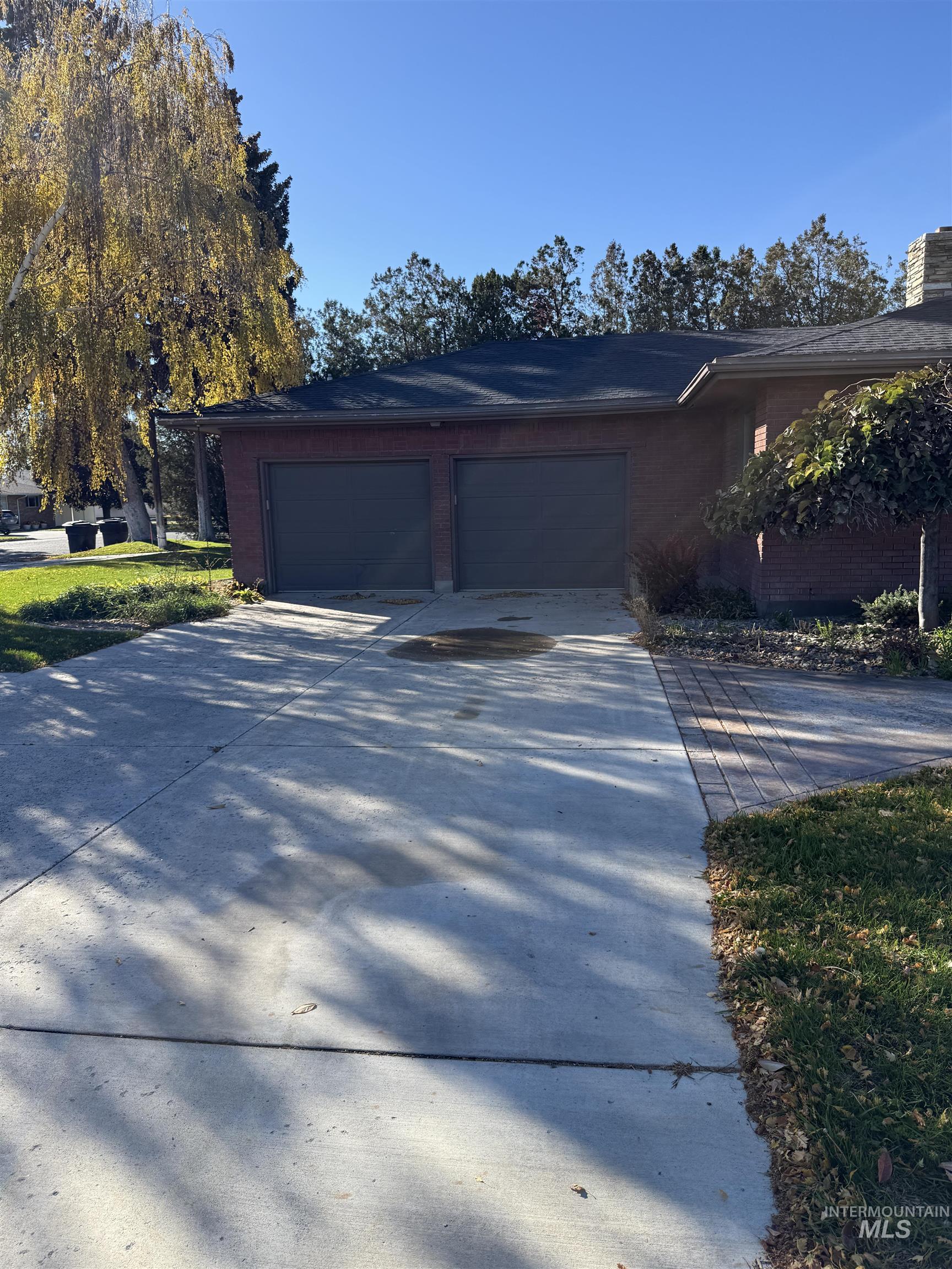 Garage with concrete driveway