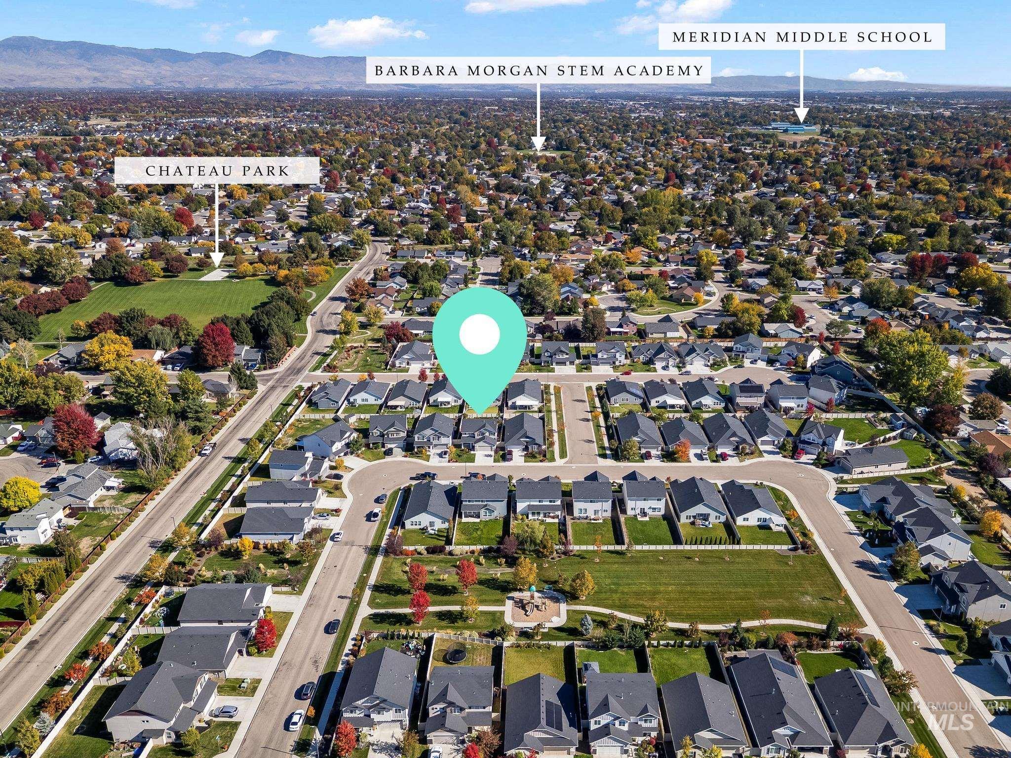 View of property location with nearby suburban area