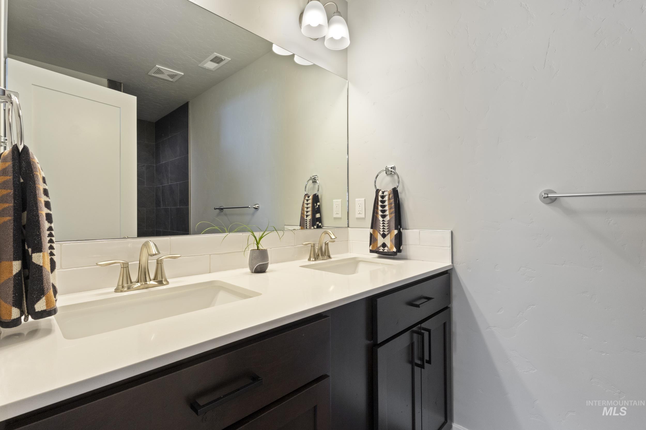 Full bath with double vanity