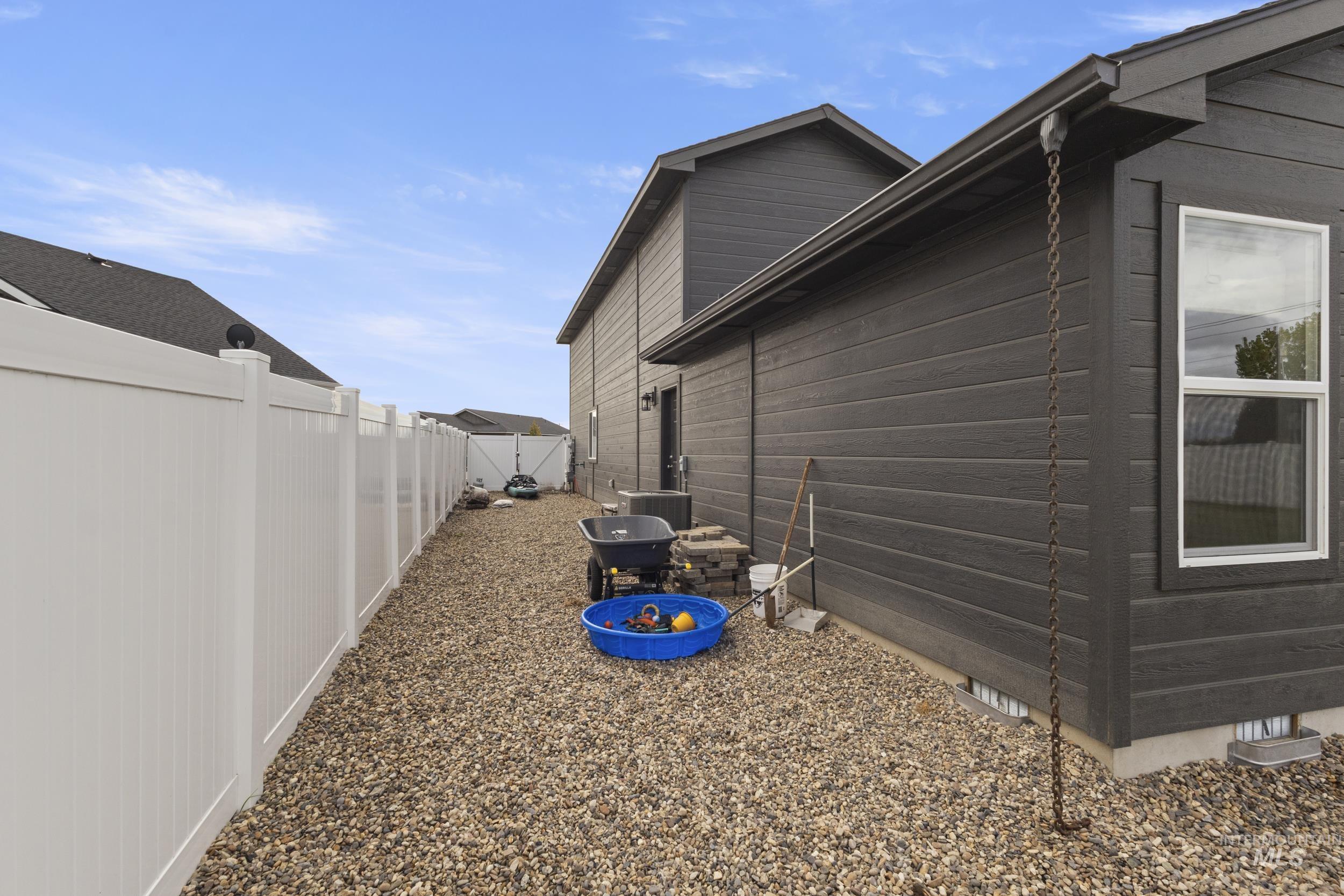 View of home's exterior with a fenced backyard