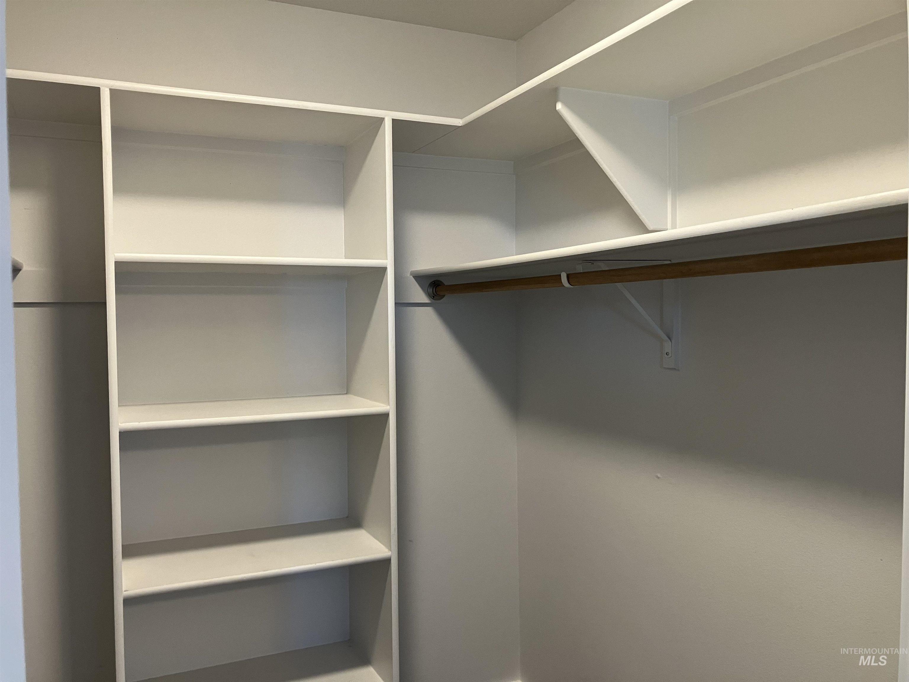 View of Master walk in closet