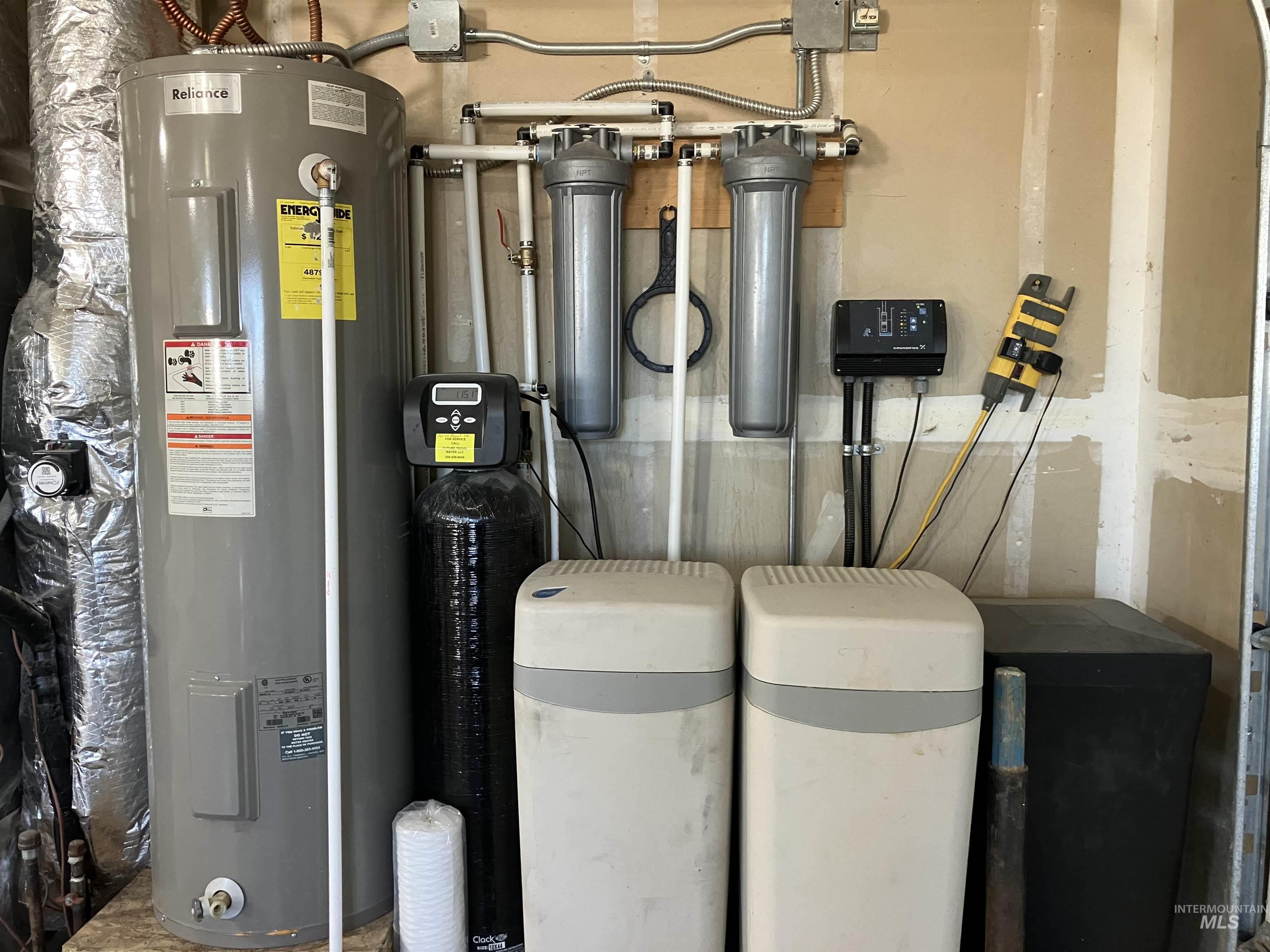 Utilities featuring water heater, water softener, and filtration system