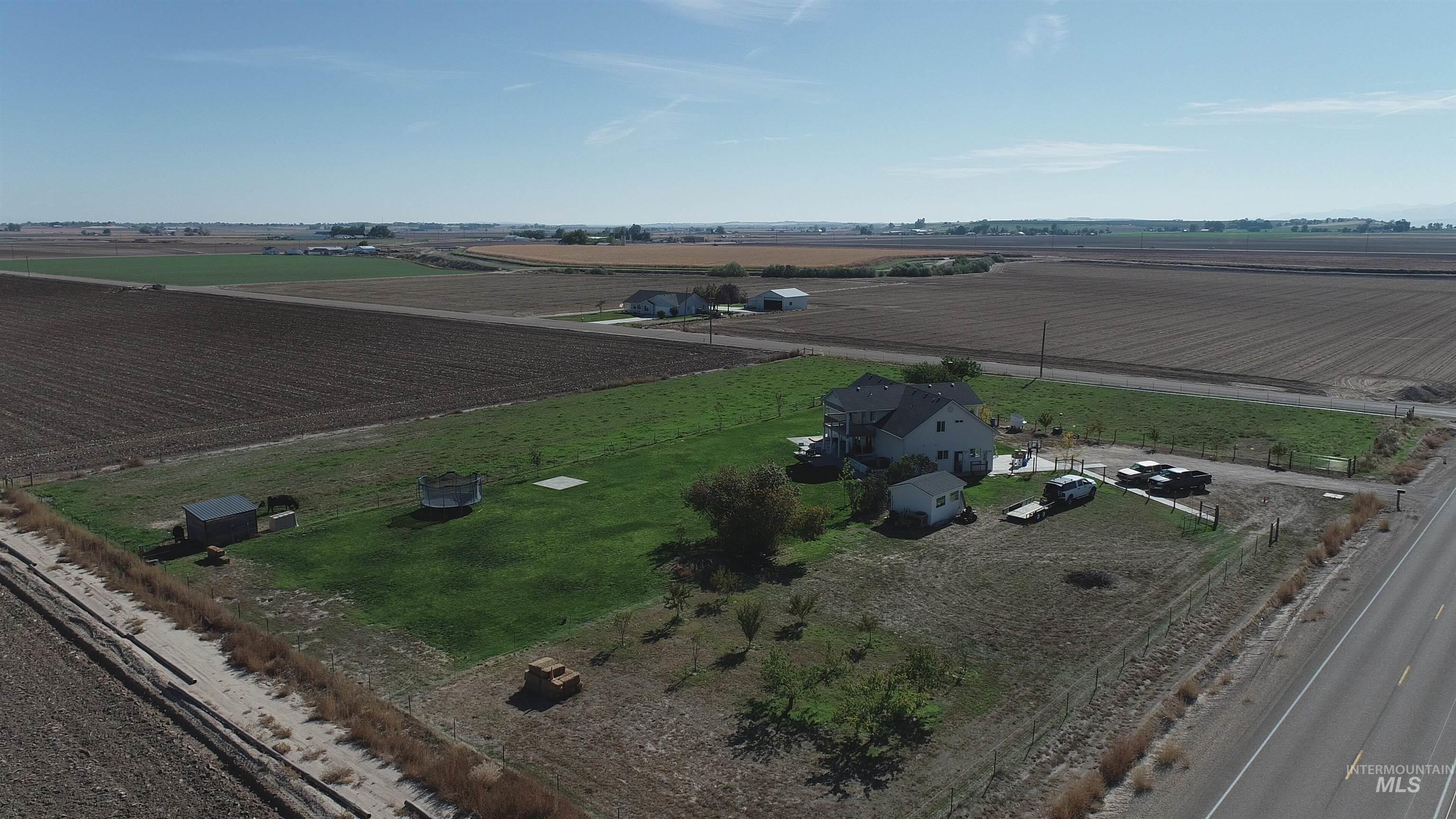 Aerial view of sparsely populated area with abundant farmland