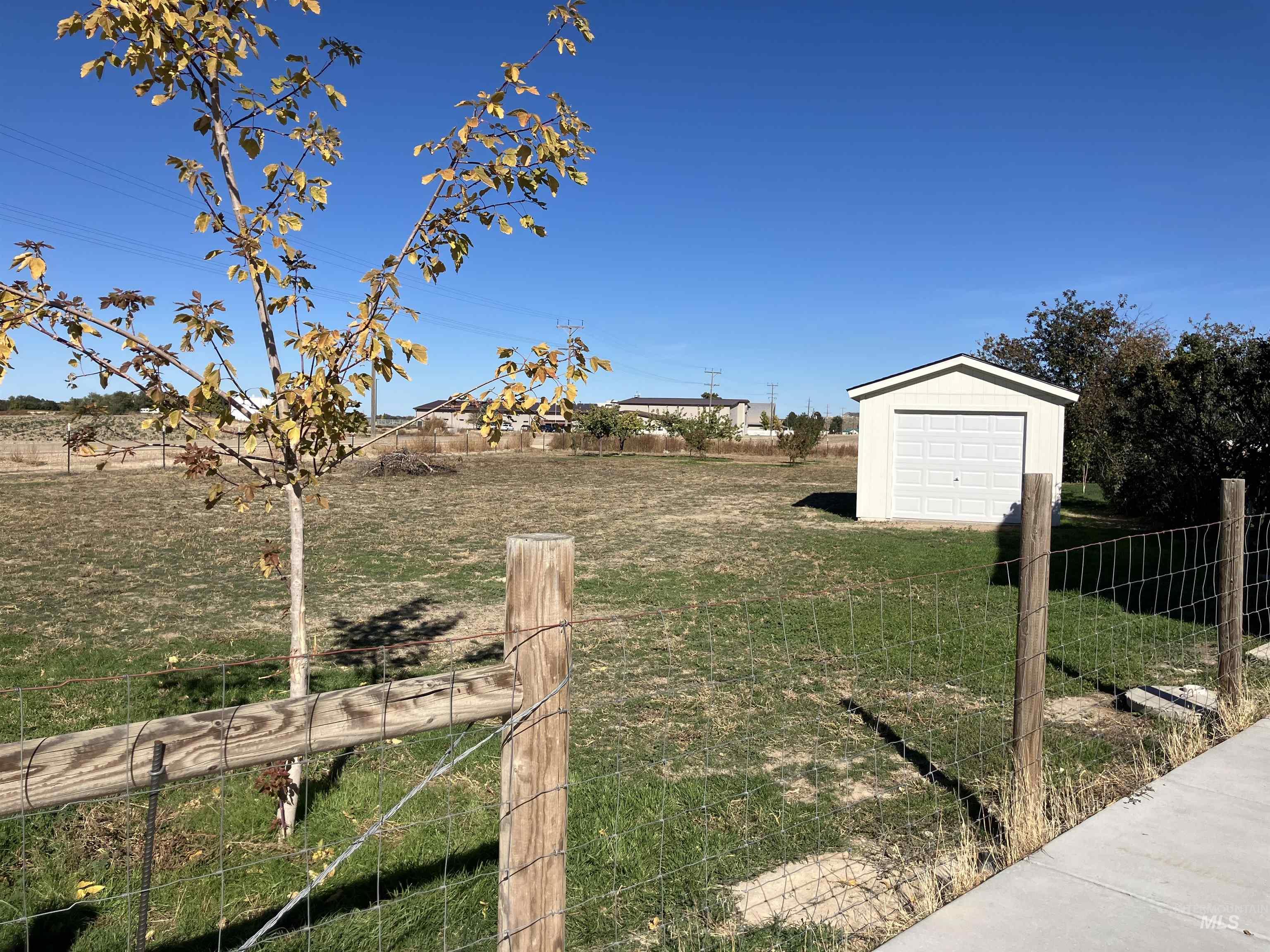 View of yard with an outbuilding