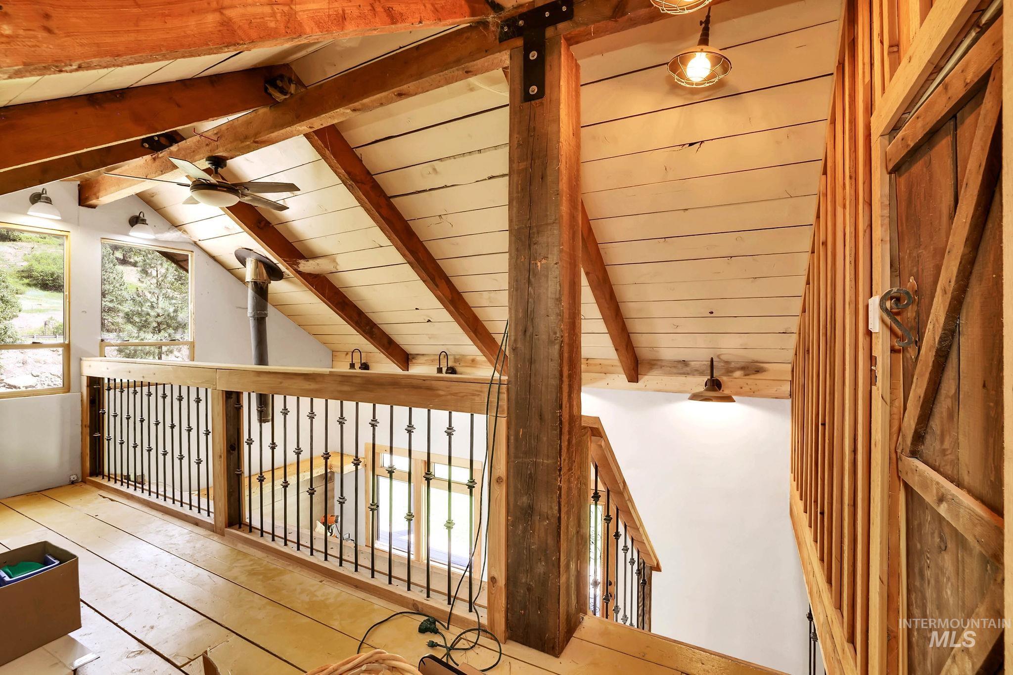 Hallway featuring wood ceiling