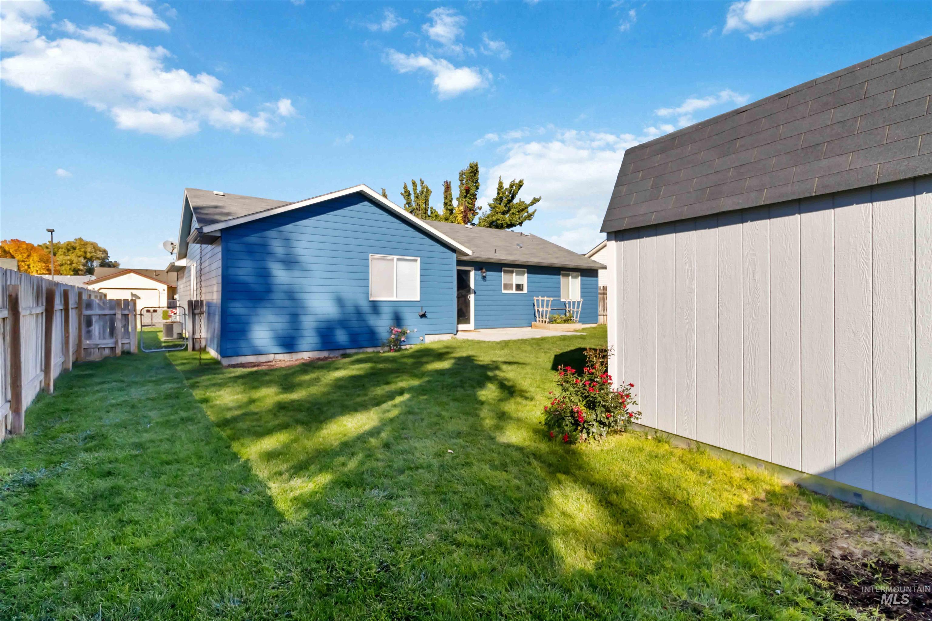 Back of house featuring a patio area and a fenced backyard